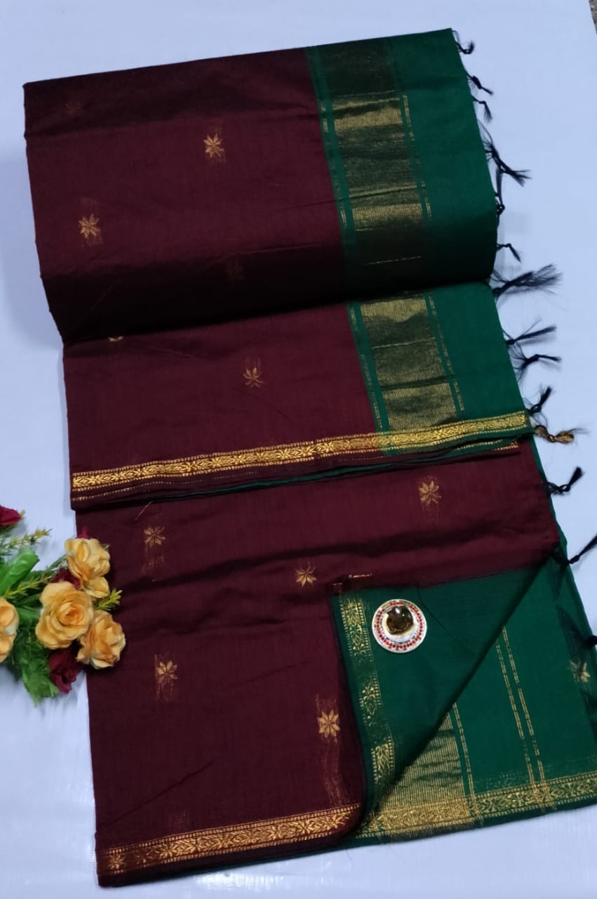Maroon and green saree with gold border on a white background. Premium Maheshwari Silk Cotton Sarees Gadwal-Inspired | Sleek Dual Borders | Contrast Pallu & Blouse.