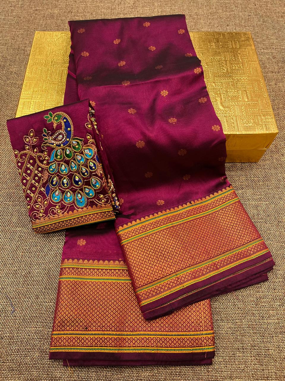 Grace your special occasions with this Traditional Border Kalanjali Paithani Saree, made from soft Tana silk and adorned with all-over buttis, a rich traditional border, and an elegant Aari Work Blouse Piece. Perfect blend of heritage and style for weddings and festive wear.