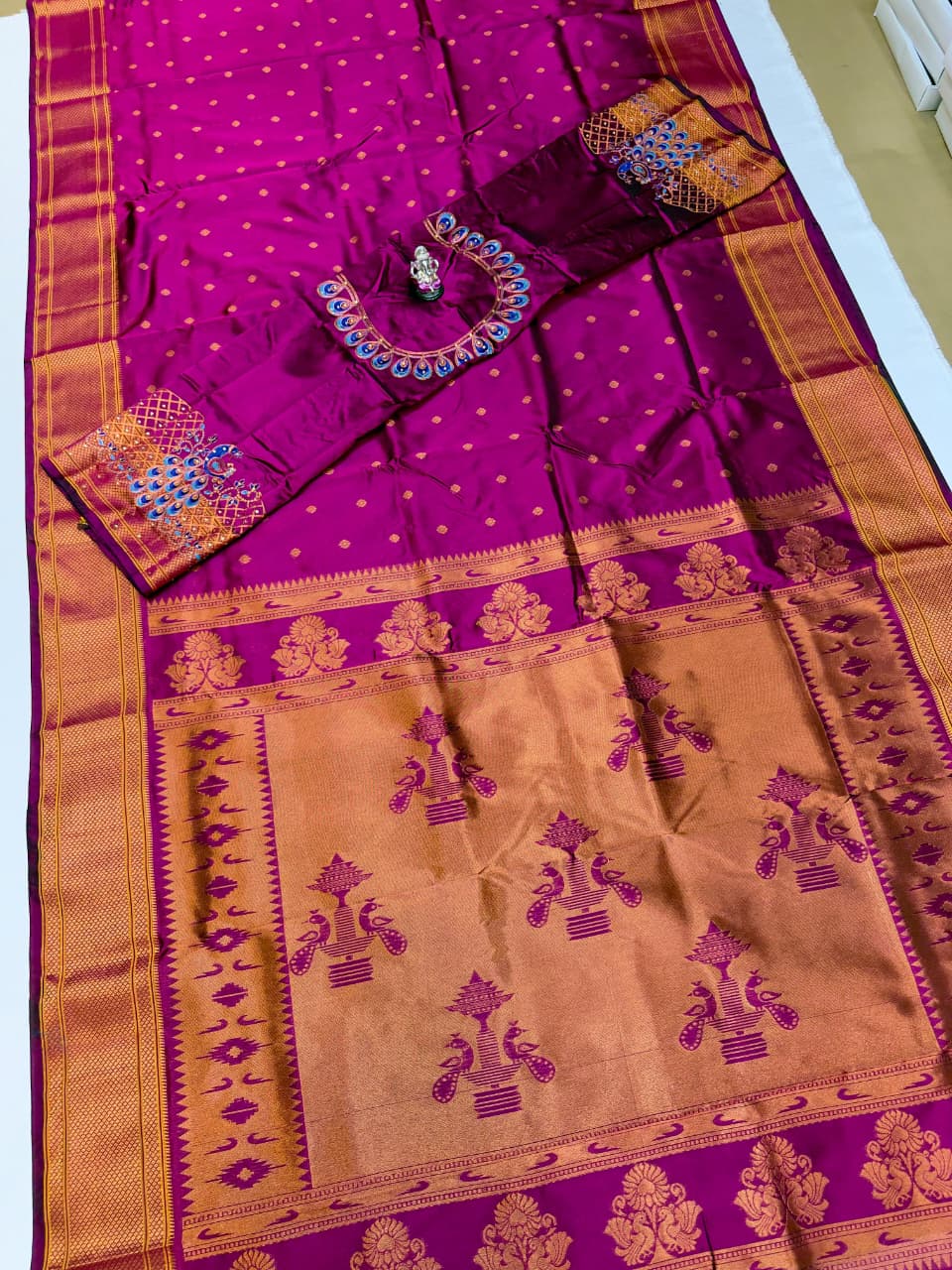 The beautiful traditional Paithani pallu enhances its royal appeal, while the exclusive designer running blouse piece completes the look. Perfect for weddings, festive celebrations, cultural events, and special occasions.