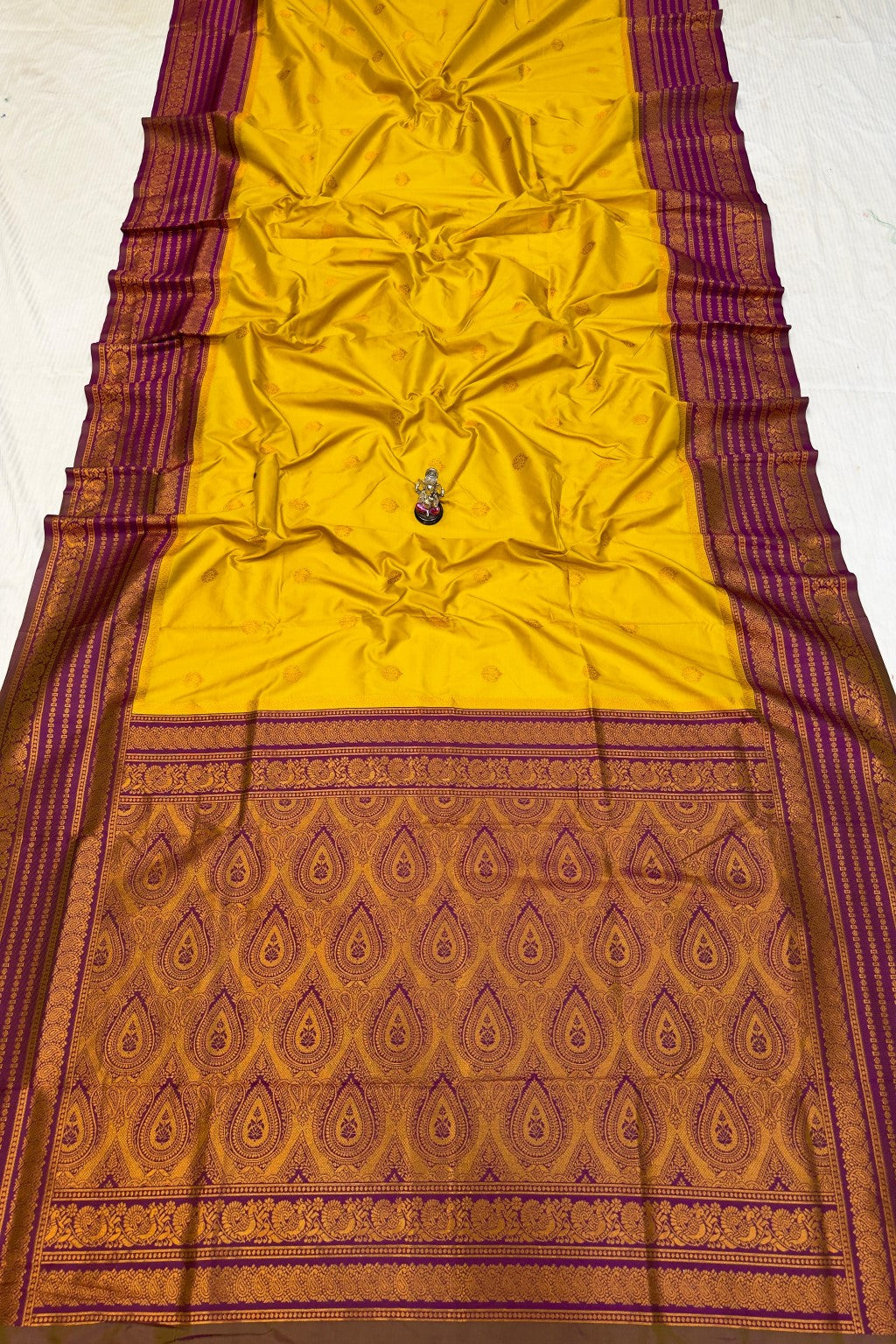 Shop Rajashri Kanjivaram Paithani Saree online at best price. Premium Katan silk feel with zari butti and Meena work, ideal for weddings, festivals, and traditional occasions.
