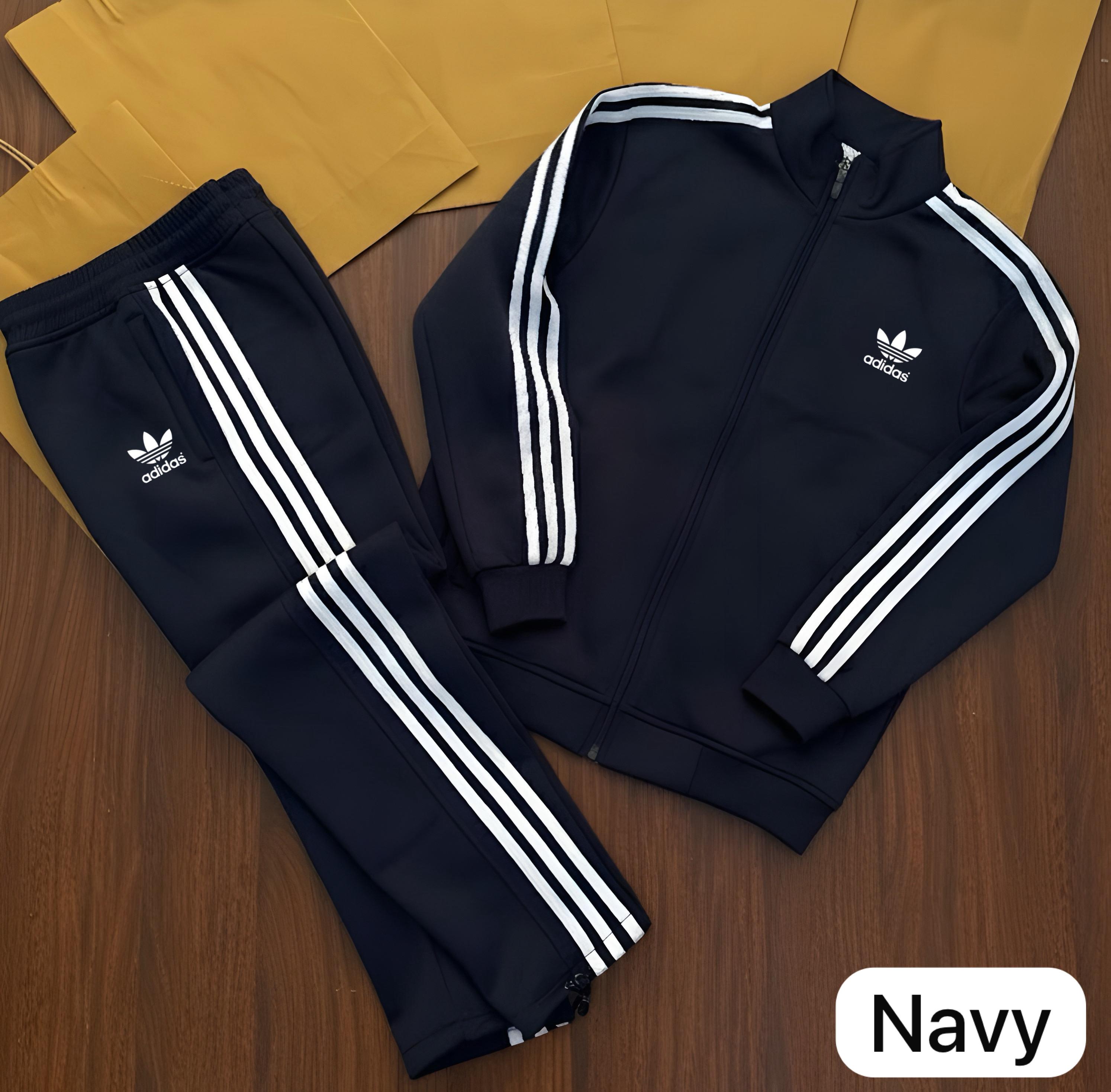 Stay warm and stylish this winter with our premium-quality ADIDAS zipper tracksuit, crafted for maximum comfort and durability.