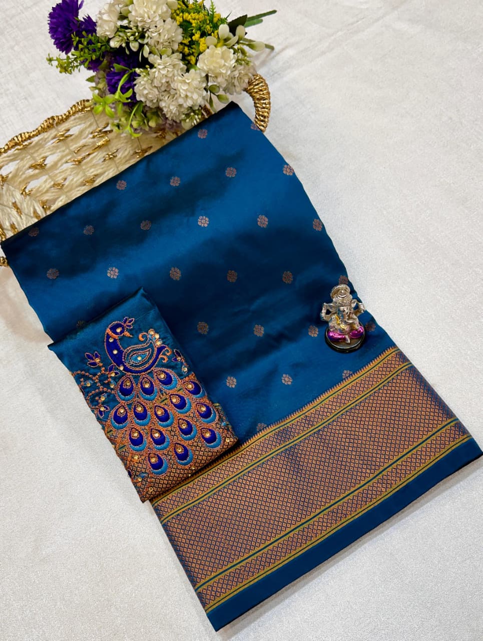 The beautiful traditional Paithani pallu enhances its royal appeal, while the exclusive designer running blouse piece completes the look. Perfect for weddings, festive celebrations, cultural events, and special occasions.