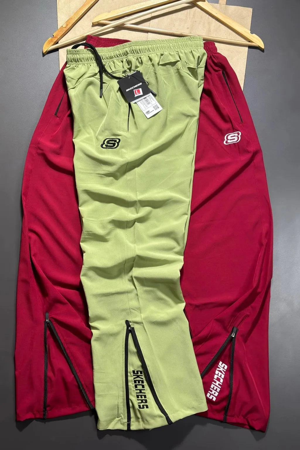 Upgrade your everyday style with our 100% Premium Jordan Lycra Trackpants by SKECHERS. Designed for performance and comfort, these trackpants offer a sleek boot-cut fit with premium stretch fabric that moves with you.