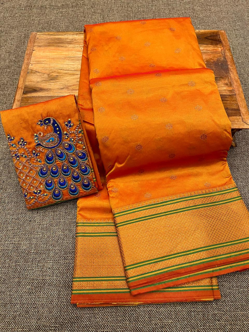 Grace your special occasions with this Traditional Border Kalanjali Paithani Saree, made from soft Tana silk and adorned with all-over buttis, a rich traditional border, and an elegant Aari Work Blouse Piece. Perfect blend of heritage and style for weddings and festive wear.