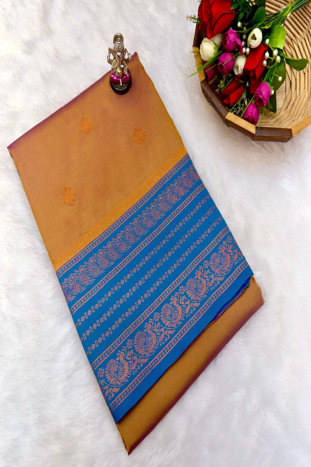 Shop Rajashri Kanjivaram Paithani Saree online at best price. Premium Katan silk feel with zari butti and Meena work, ideal for weddings, festivals, and traditional occasions.