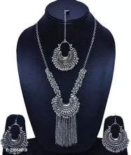 Load image into Gallery viewer, Shimmering Trending Oxide Silver Diva Style Alloy Jewellery Set For Women

Color: Silver
Material: Oxide Alloy Silver
Country of Origin: INDIA

Striking a perfect balance of tradition and elegance, this oxidized silver-plated jewellery set has a breathtaking design. This set has got beautiful textured design that add to the overall appeal. Team it with any ethnic outfit for adding a traditional grace.