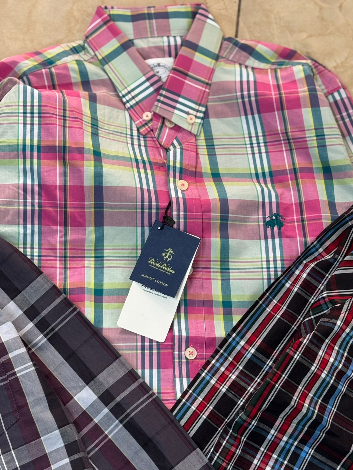 Upgrade your wardrobe with the Brook Brother Premium Cotton Check Shirt, crafted from 100% pure cotton for ultimate comfort and breathabilit