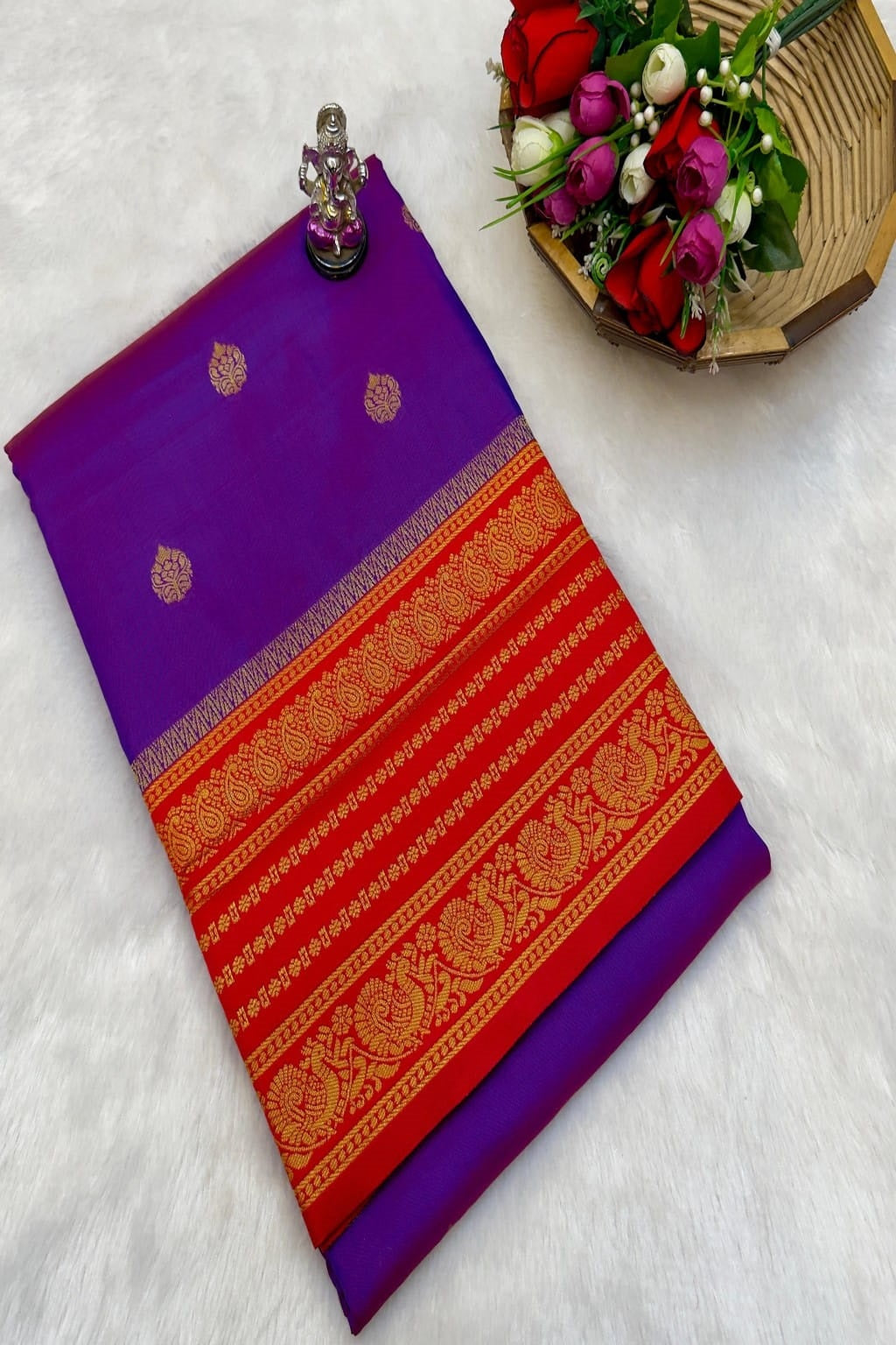 Shop Rajashri Kanjivaram Paithani Saree online at best price. Premium Katan silk feel with zari butti and Meena work, ideal for weddings, festivals, and traditional occasions.