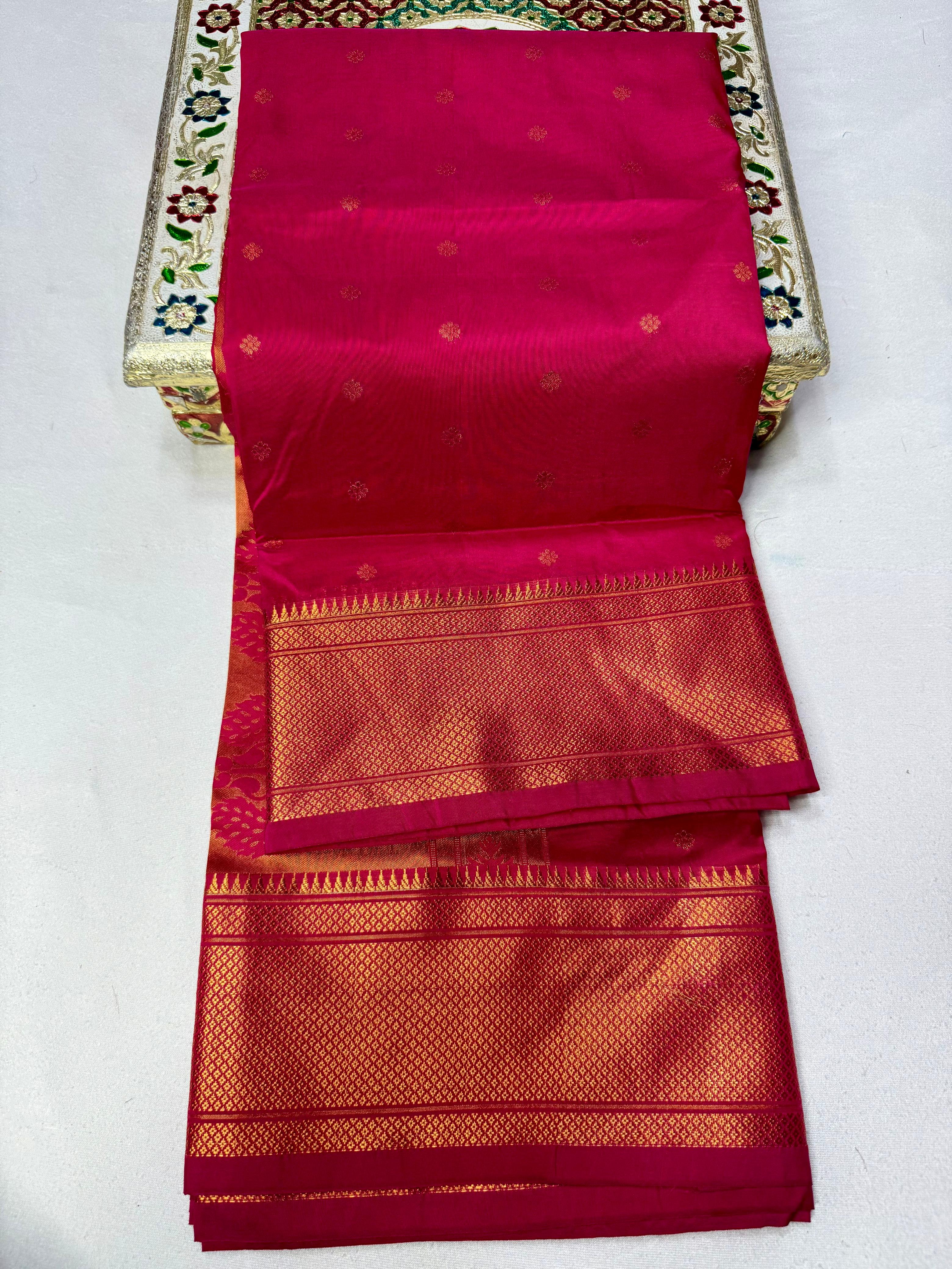 Traditional Tana Silk Kalanjali Paithani with rich Maharani pallu, crafted in premium pure soft silk. Featuring all-over Karnfuli butti, classic traditional border, and running blouse piece. A viral trending Paithani saree perfect for weddings, festivals, and special occasions.