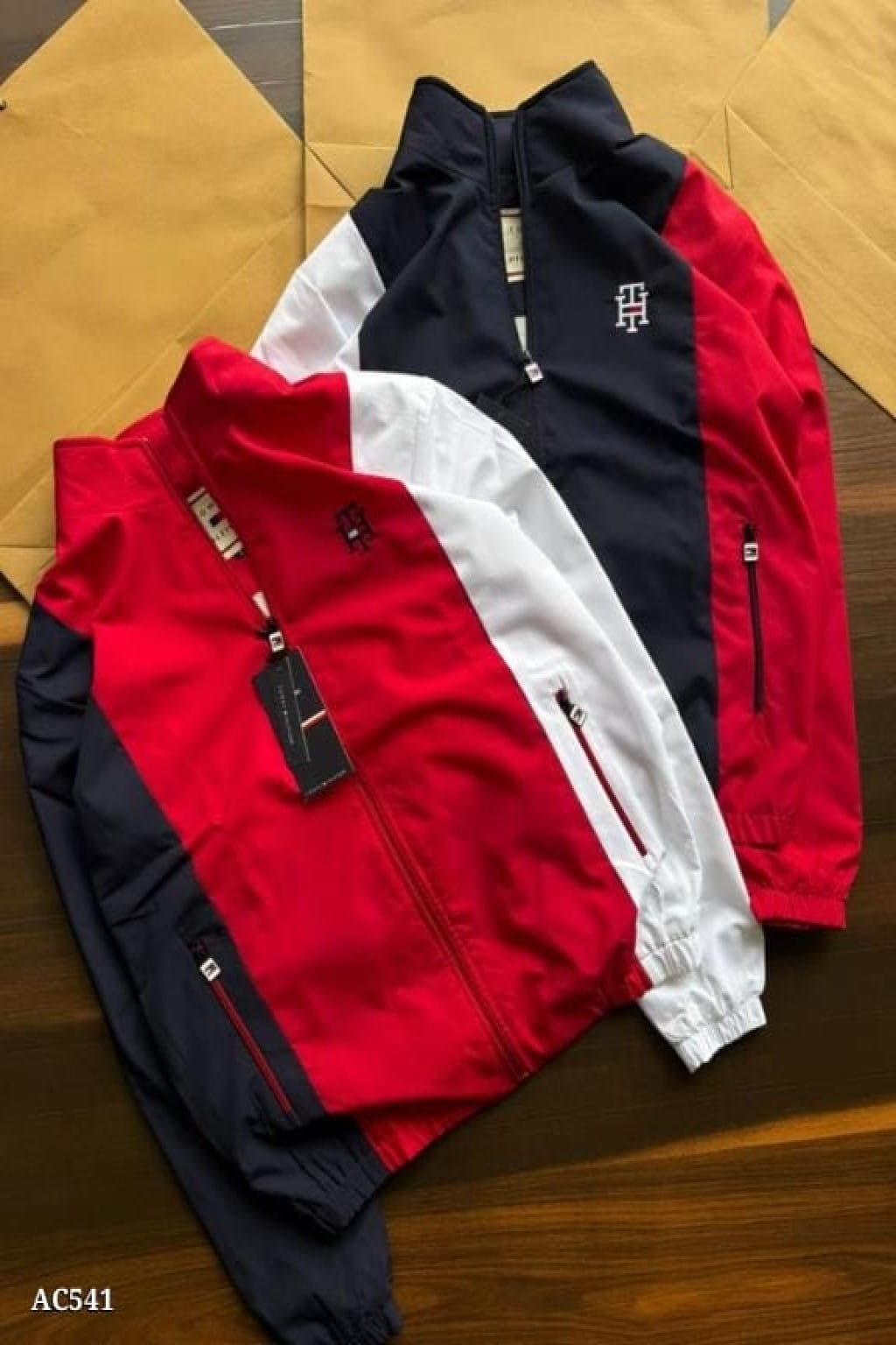 stylish embroidery detailing and both-side zip pockets, this windcheater offers a perfect blend of functionality and premium design. The soft net lining inside enhances comfort, making it ideal for daily wear, travel, or outdoor activities.