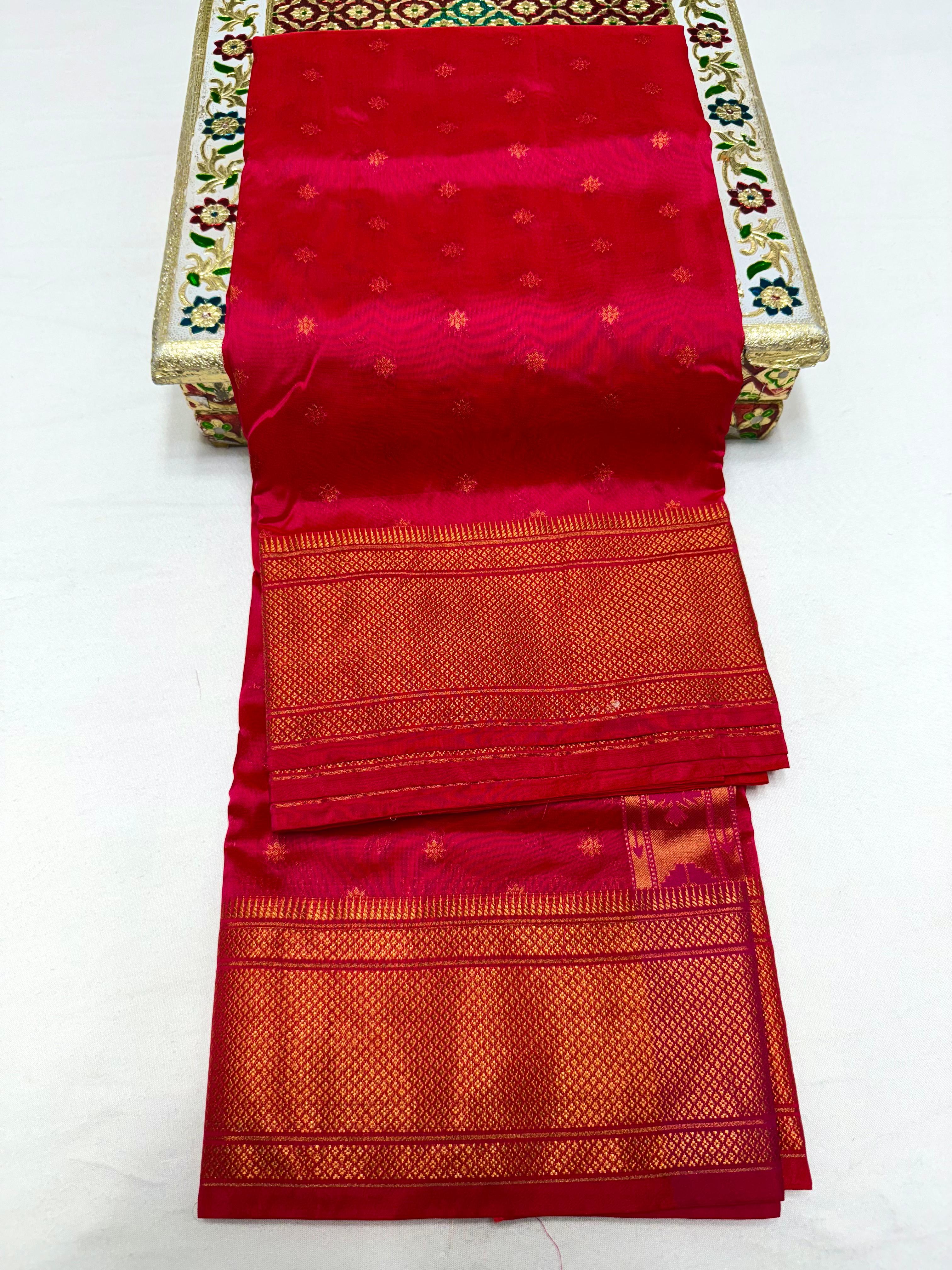 Traditional Tana Silk Kalanjali Paithani with rich Maharani pallu, crafted in premium pure soft silk. Featuring all-over Karnfuli butti, classic traditional border, and running blouse piece. A viral trending Paithani saree perfect for weddings, festivals, and special occasions.
