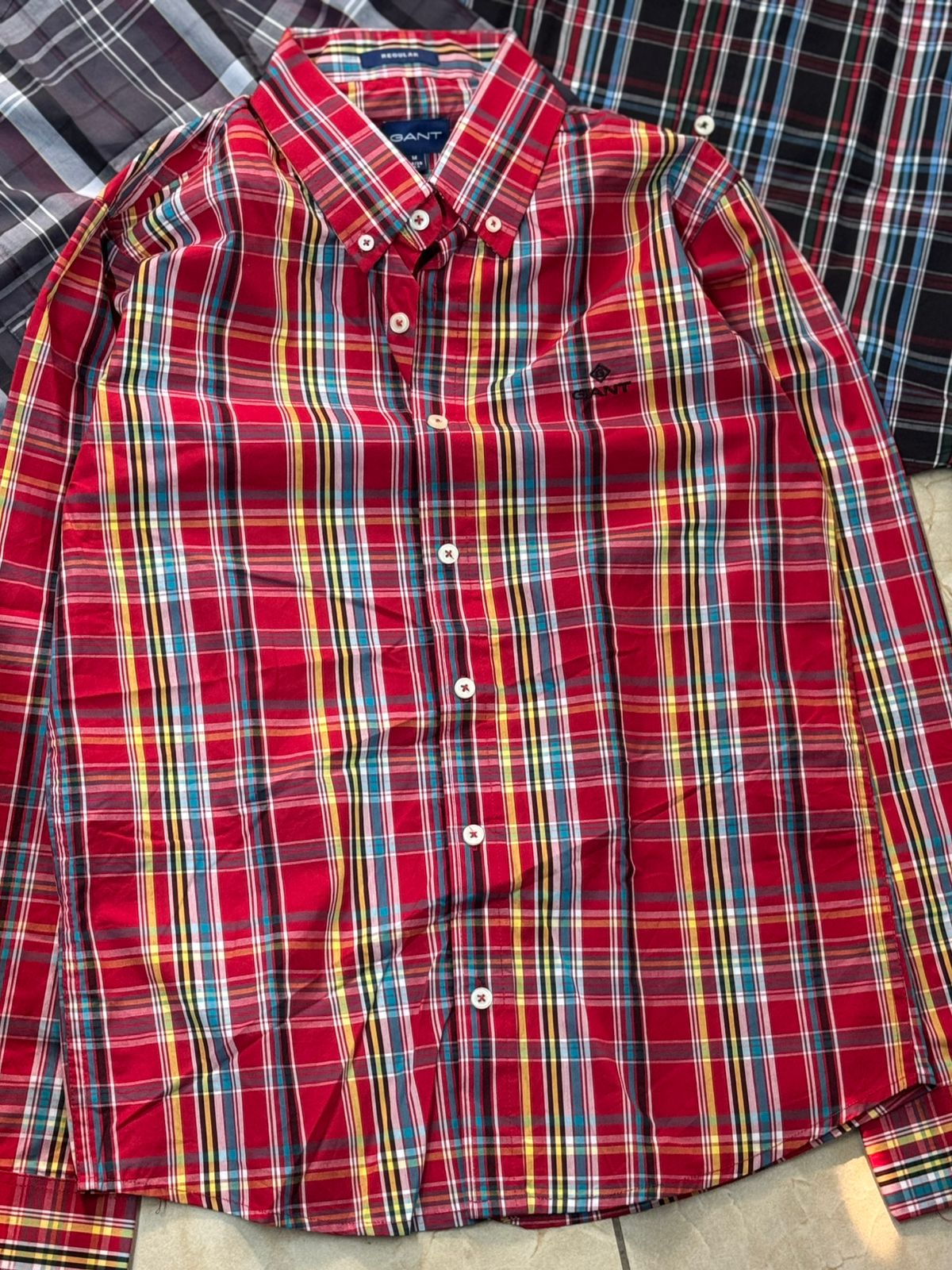 Upgrade your wardrobe with the Brook Brother Premium Cotton Check Shirt, crafted from 100% pure cotton for ultimate comfort and breathabilit