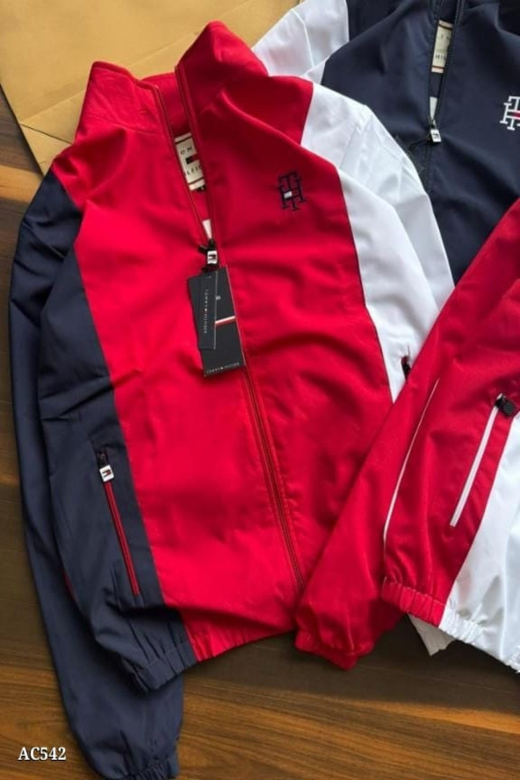 stylish embroidery detailing and both-side zip pockets, this windcheater offers a perfect blend of functionality and premium design. The soft net lining inside enhances comfort, making it ideal for daily wear, travel, or outdoor activities.