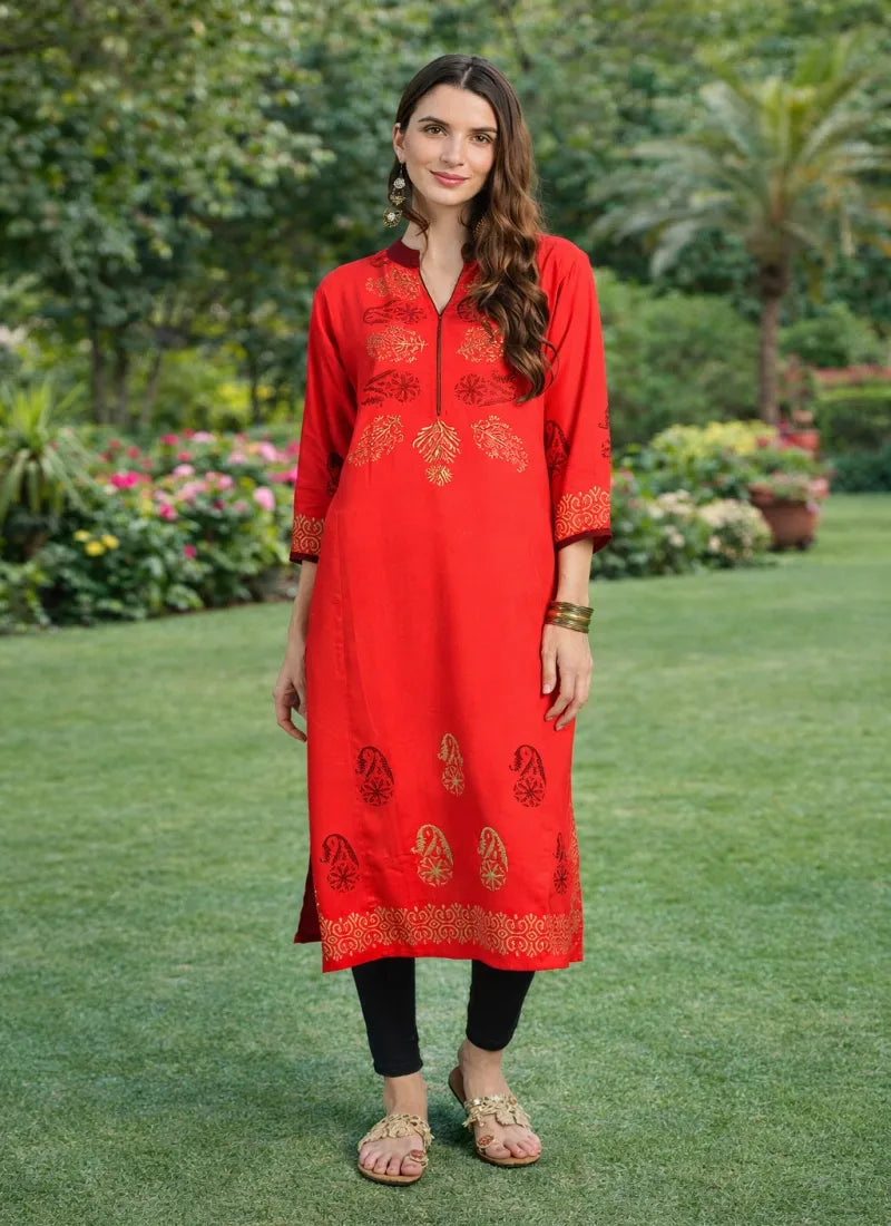 The Gorgeous Red Rayon Kurti is a sensational customer favorite with Gold and black&nbsp; design to enhance looks. and we hope you like it just as much. This Kurti, Gown Step into elegance with our stunning Gorgeous Rayon Kurti in Red with Gold/Black, destined to impress with its exquisite craftsmanship and timeless style.