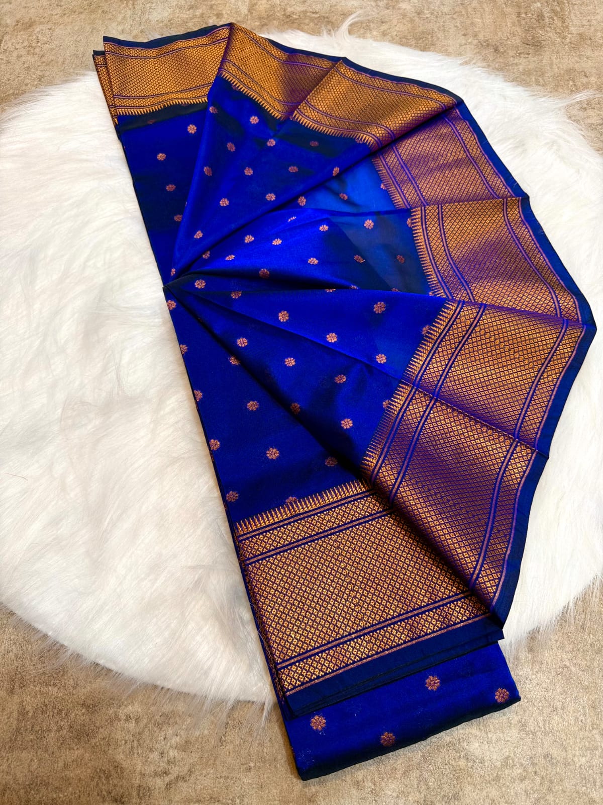 Step into elegance with our Kalanjali Paithani-Style Saree, a perfect blend of trending traditional charm and Maharani pallu grandeur. 