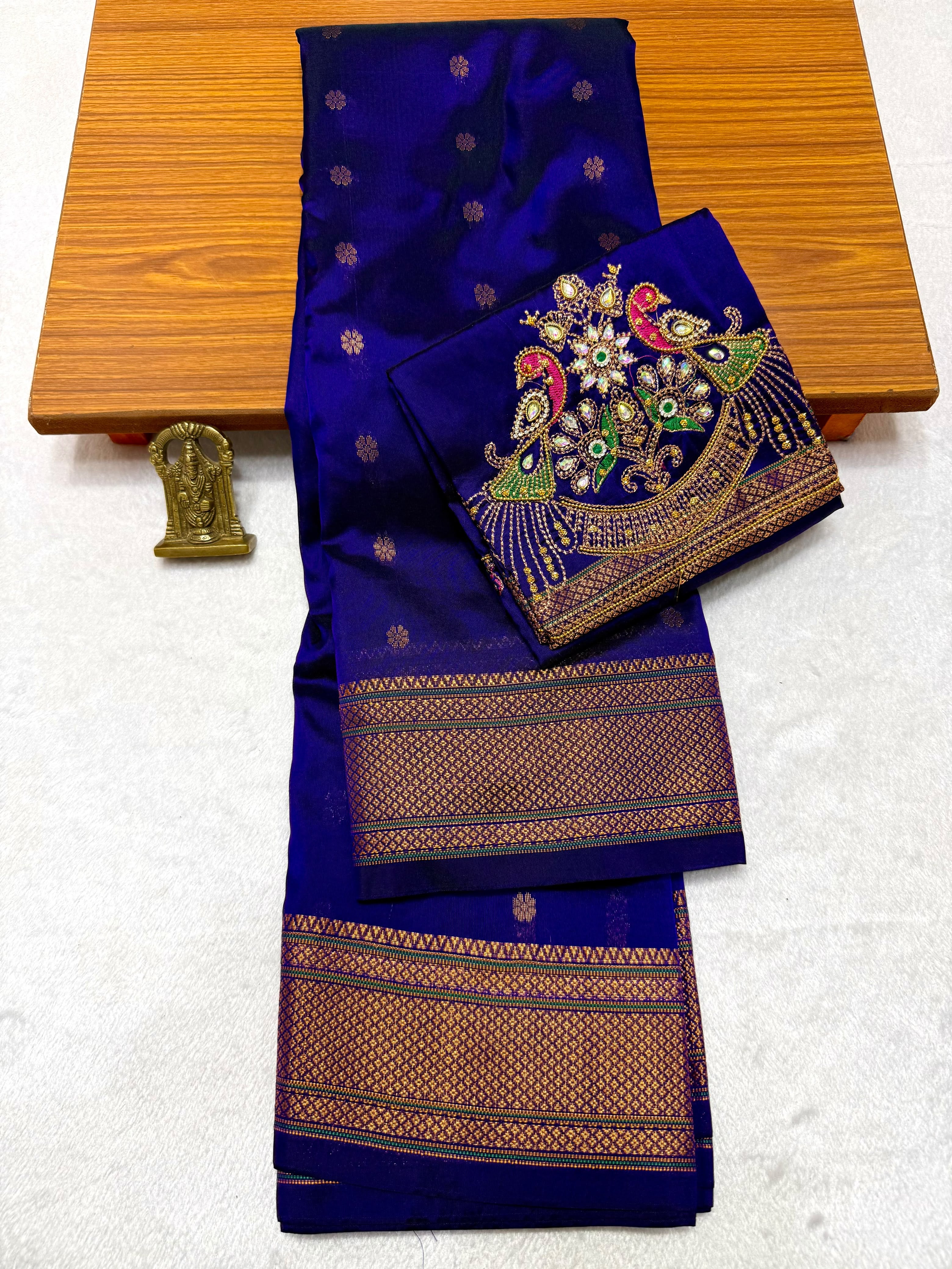 Shop elegant Pure Silk Copy Kalanjali Paithani Sarees featuring all-over butti design, rich pallu, premium Tana silk fabric, and exquisite Aari work blouse piece. Premium quality ethnic wear for weddings, festivals, and special occasions.