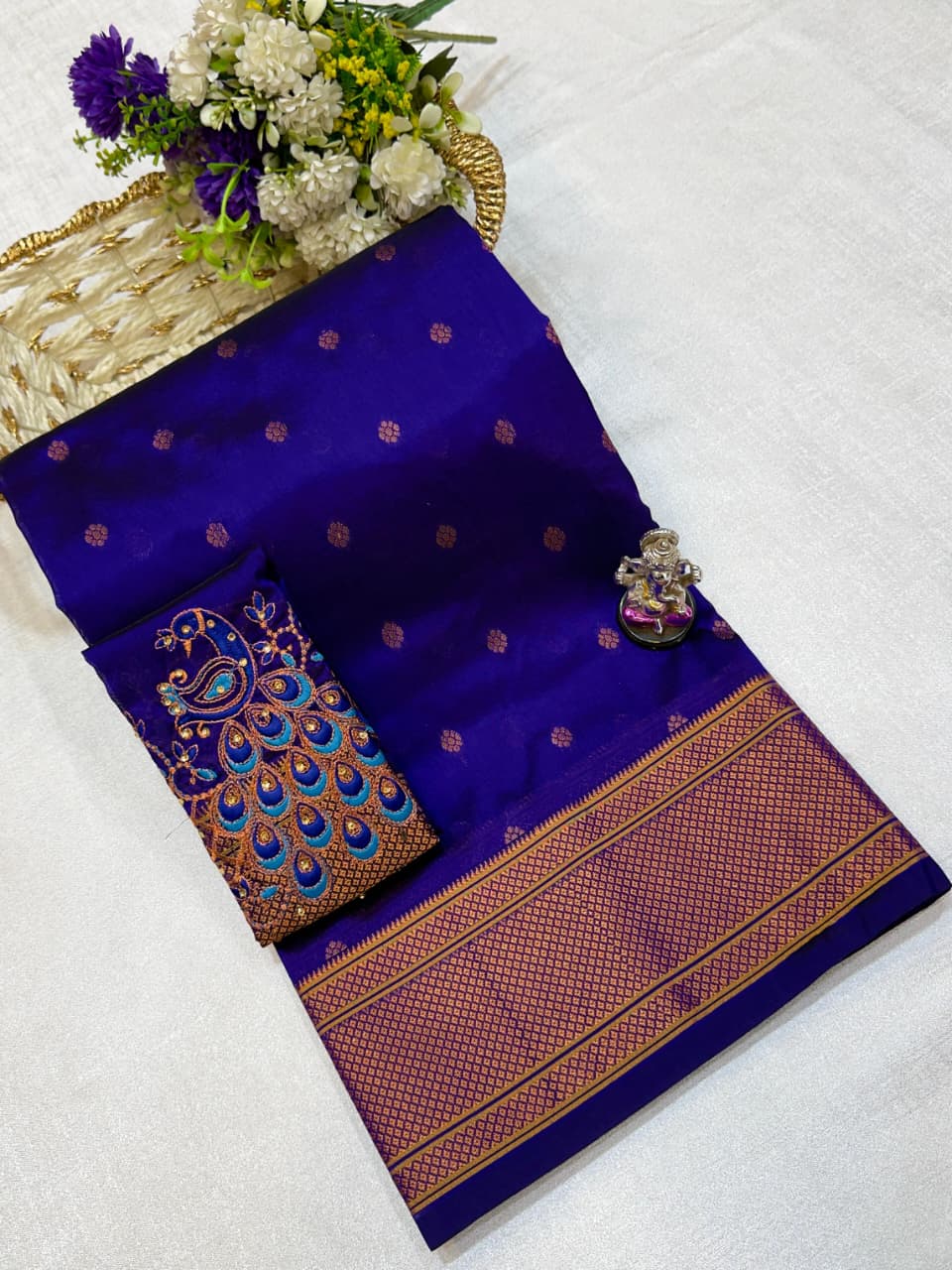 The beautiful traditional Paithani pallu enhances its royal appeal, while the exclusive designer running blouse piece completes the look. Perfect for weddings, festive celebrations, cultural events, and special occasions.
