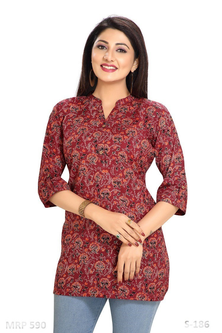 Maroon color with Floral&nbsp; Cotton Tops S-186-Prem, Partwear which is cool and Glamup your looks.

Fabric:Cotton
Color : Maroon with floral print
Style:&nbsp; Short Kurti&nbsp;
Use : Office use and use anywhere in function, wedding, Birthday, Partywear
Bust size: 40
