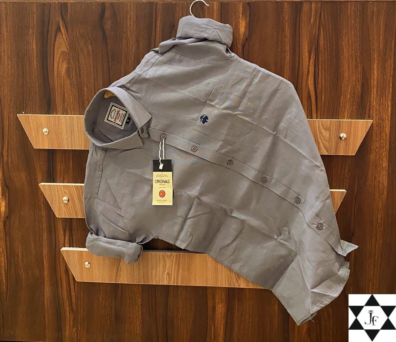 Elevate your wardrobe with this premium Brooks Full Sleeve Shirt, crafted from Stuff Pure Cotton for all-day comfort and elegance. Designed for both festive and regular wear, this plain-colored shirt is your perfect go-to for any occasion.