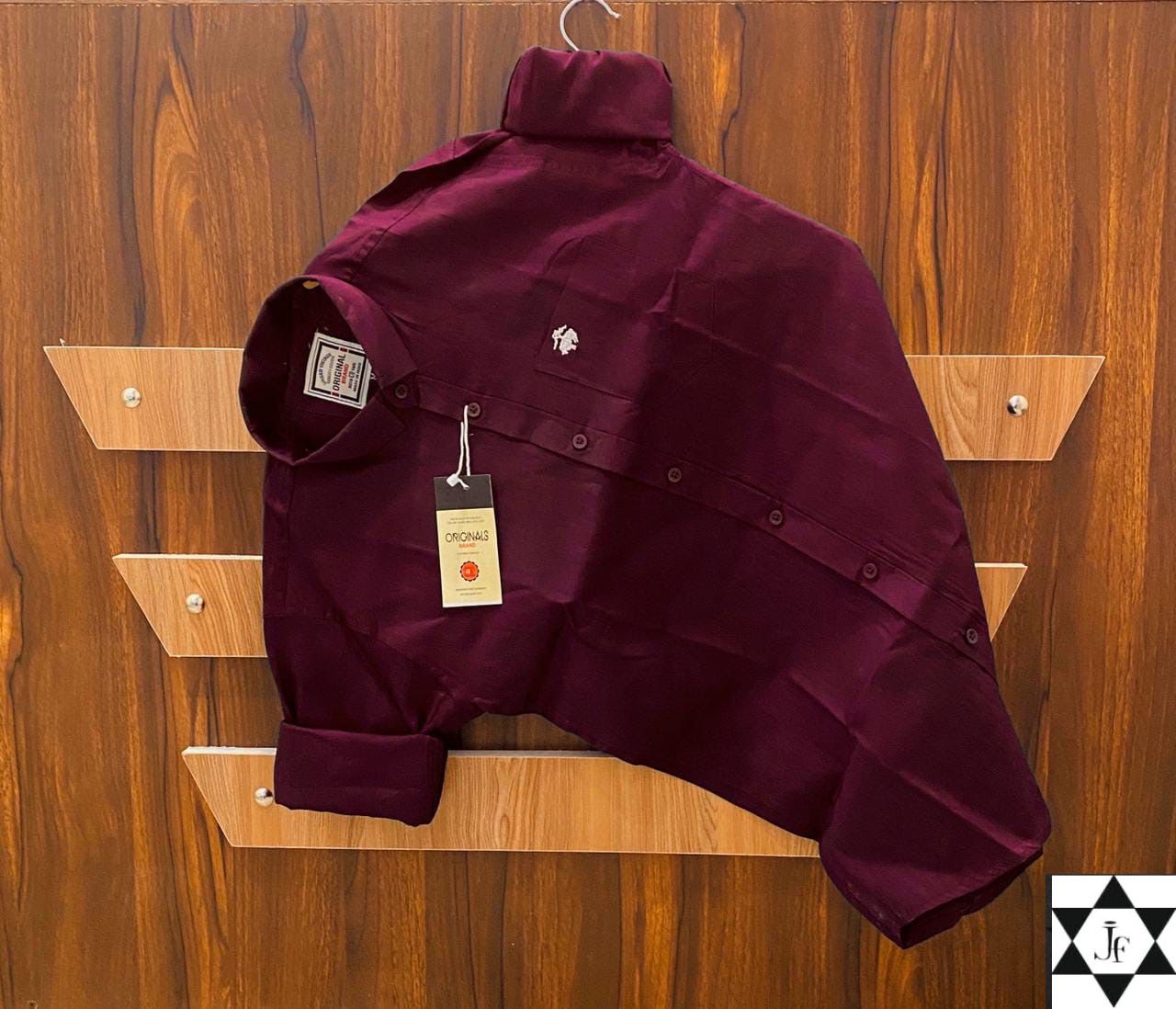 Elevate your wardrobe with this premium Brooks Full Sleeve Shirt, crafted from Stuff Pure Cotton for all-day comfort and elegance. Designed for both festive and regular wear, this plain-colored shirt is your perfect go-to for any occasion.