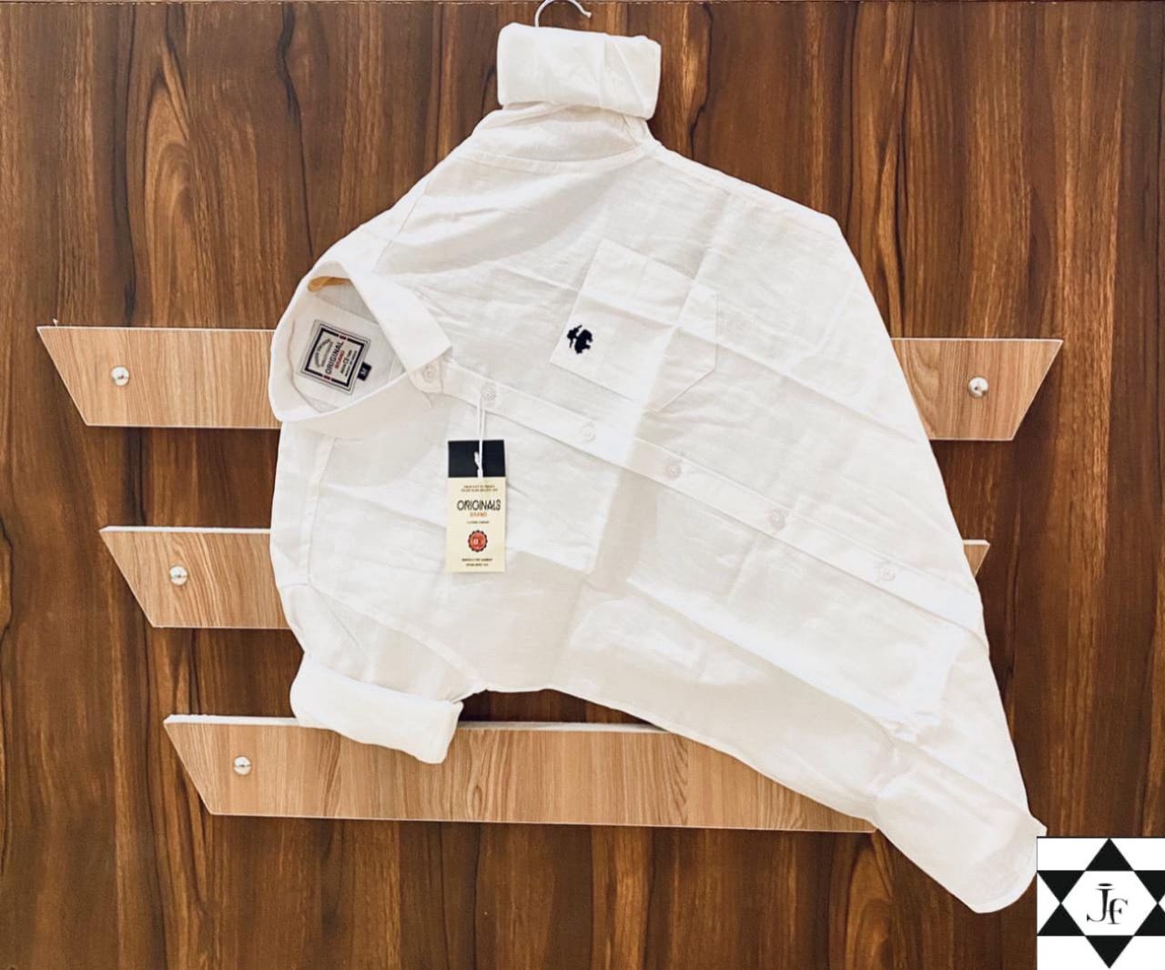 Elevate your wardrobe with this premium Brooks Full Sleeve Shirt, crafted from Stuff Pure Cotton for all-day comfort and elegance. Designed for both festive and regular wear, this plain-colored shirt is your perfect go-to for any occasion.