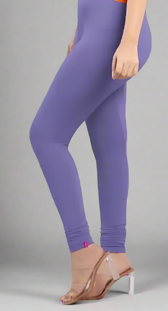 Enhance your wardrobe with our stylish and comfortable Polyester Solid Leggings for women. Made with modern influences, these leggings offer a cool and chic look, while providing maximum comfort. Perfect for any occasion, these leggings are a must-have for the fashion-forward woman.