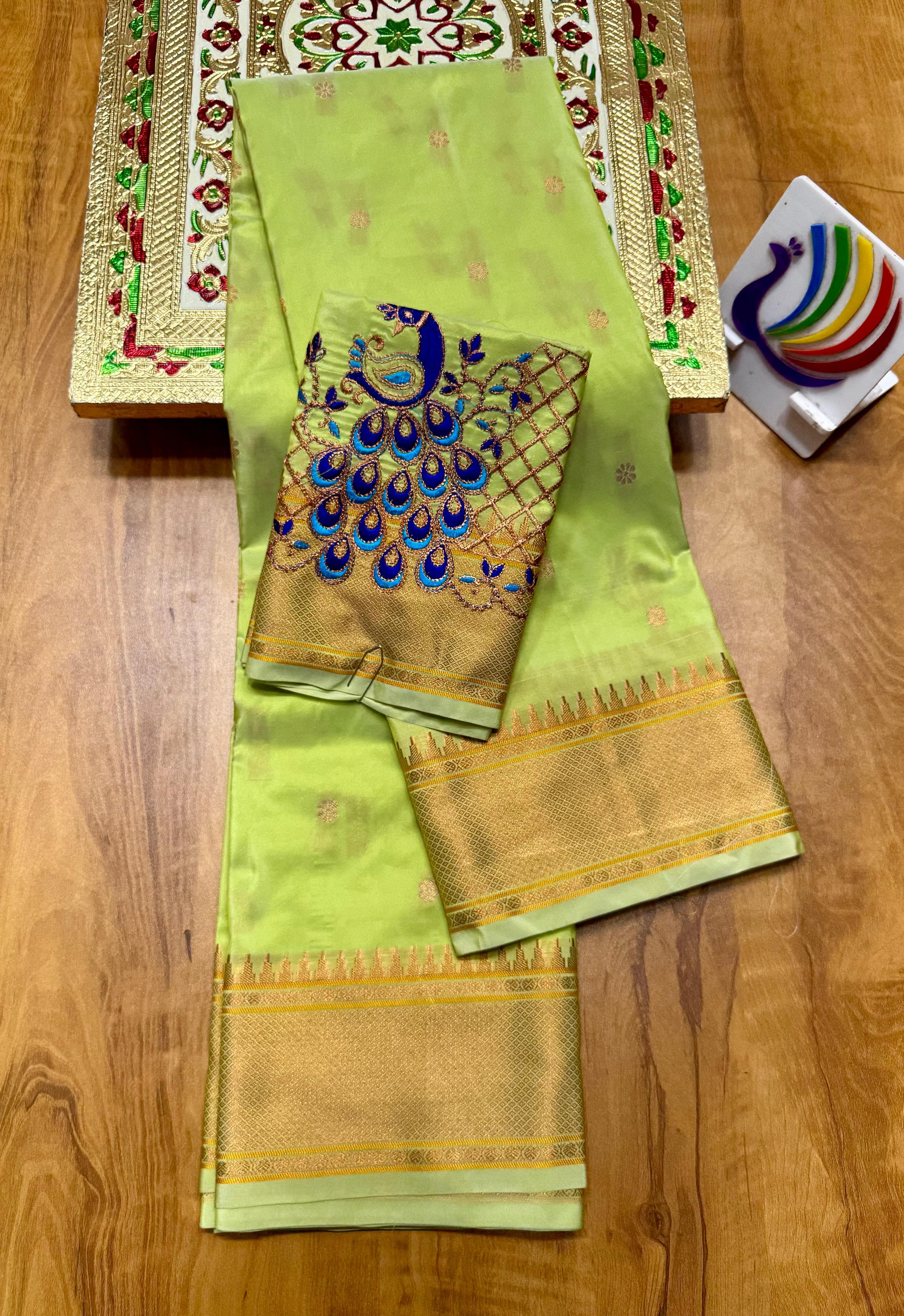 Discover the richness of tradition with our New Launching Kalanjali Bindiya Paithani Saree, a timeless creation woven in premium soft; shiny Tana silk. Designed with all-over buttis, a rich intricately styled pallu, and a copper zari border small temple, this saree reflects true craftsmanship and cultural heritage.