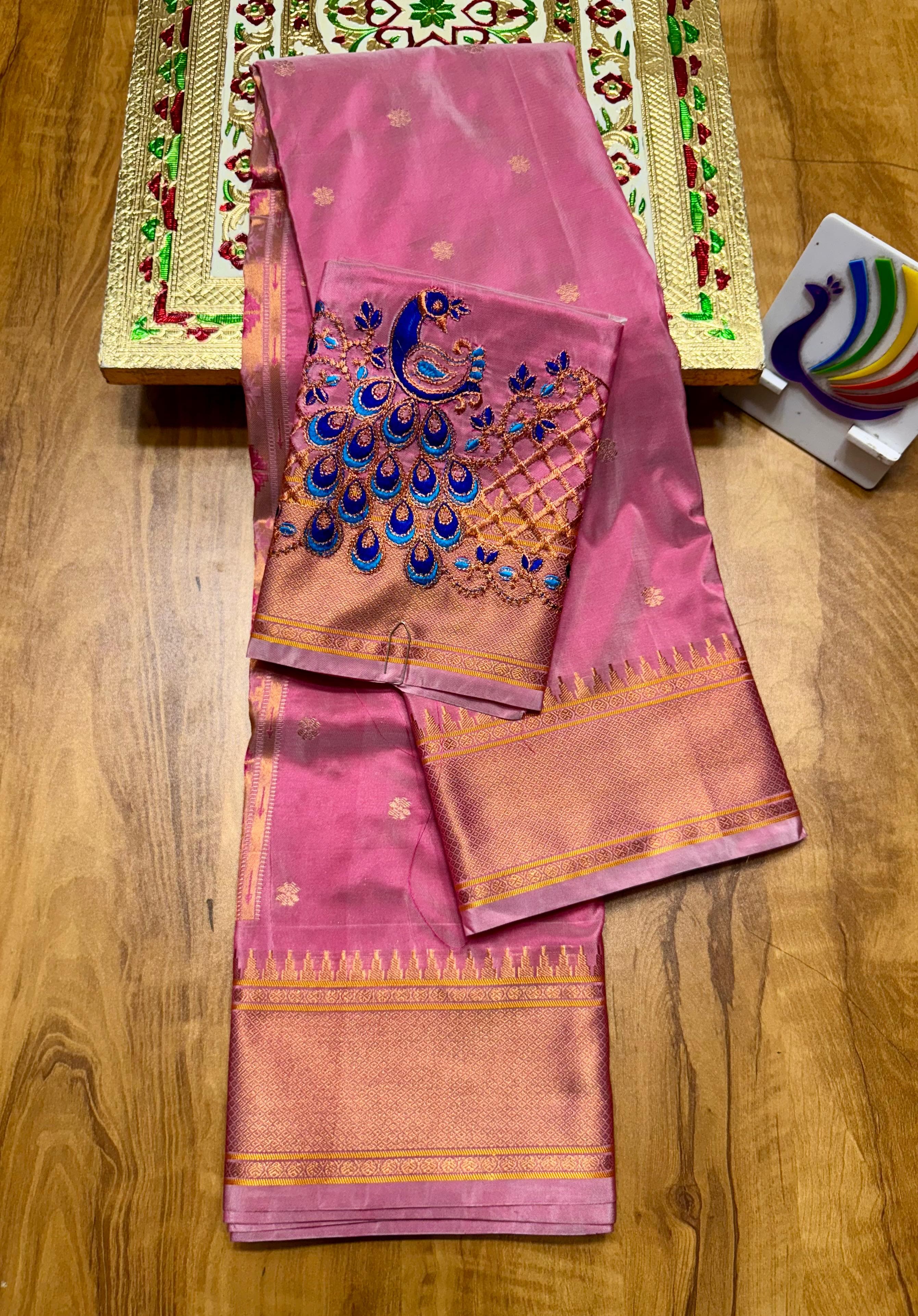 Discover the richness of tradition with our New Launching Kalanjali Bindiya Paithani Saree, a timeless creation woven in premium soft ; shiny Tana silk. Designed with all-over buttis, a rich intricately styled pallu, and a copper zari border small temple, this saree reflects true craftsmanship and cultural heritage.