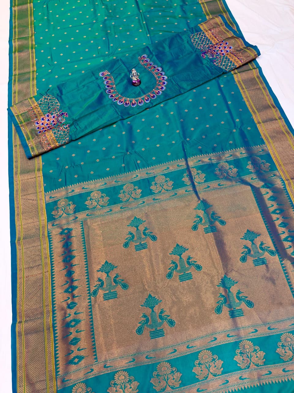 The beautiful traditional Paithani pallu enhances its royal appeal, while the exclusive designer running blouse piece completes the look. Perfect for weddings, festive celebrations, cultural events, and special occasions.