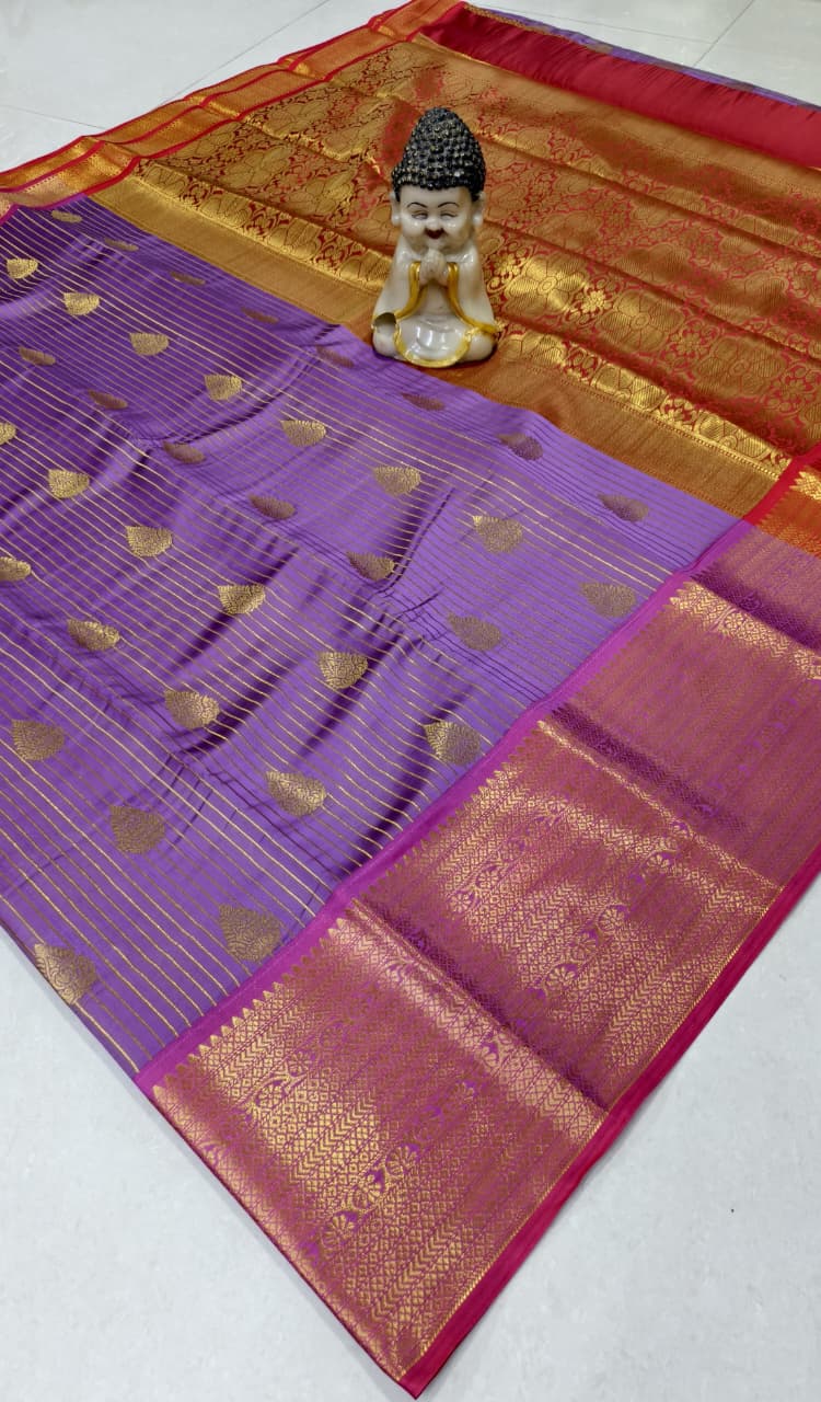 Step into elegance with our Vaira Oosi Saree, crafted to give a rich and graceful traditional look. The beautiful red base with golden zari weaving makes it perfect for all special occasions.