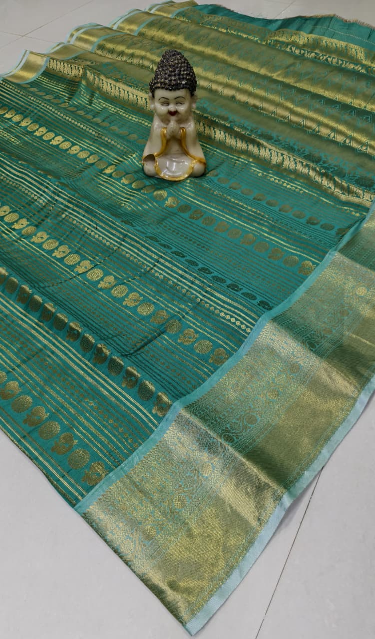 Step into elegance with our Vaira Oosi Saree, crafted to give a rich and graceful traditional look. The beautiful red base with golden zari weaving makes it perfect for all special occasions.