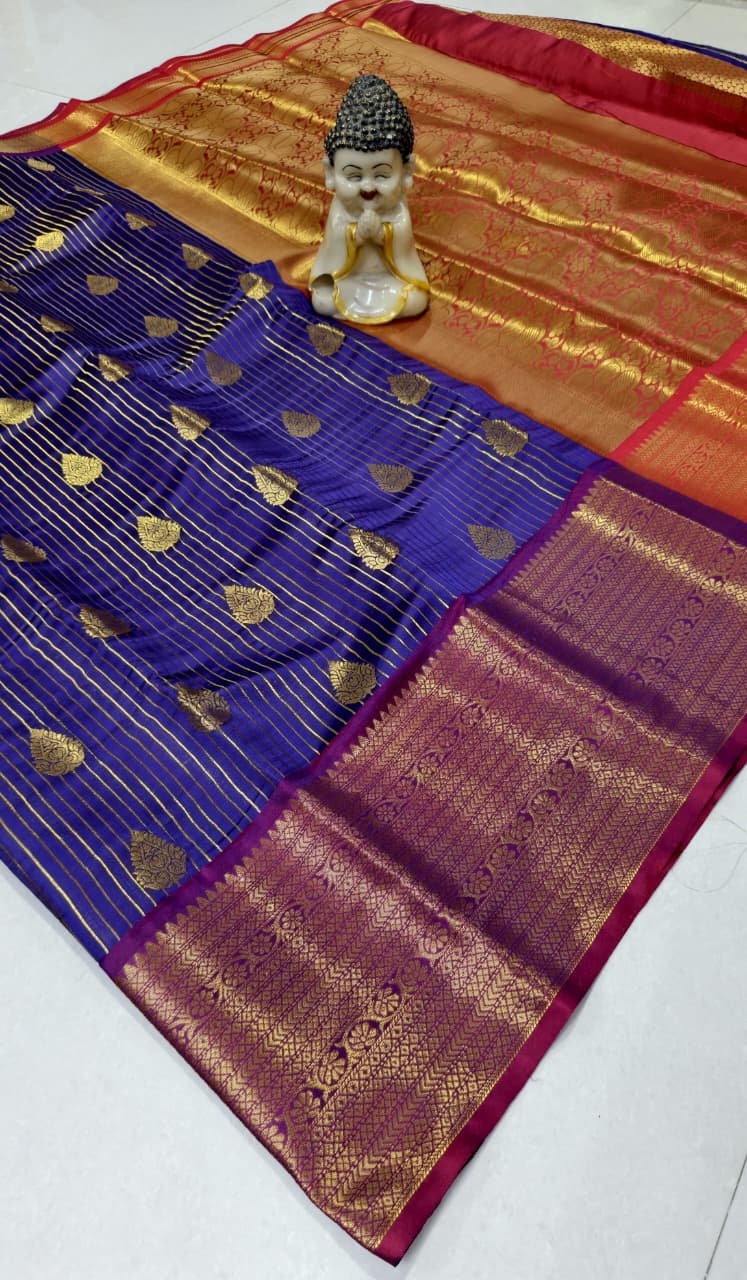 Step into elegance with our Vaira Oosi Saree, crafted to give a rich and graceful traditional look. The beautiful red base with golden zari weaving makes it perfect for all special occasions.