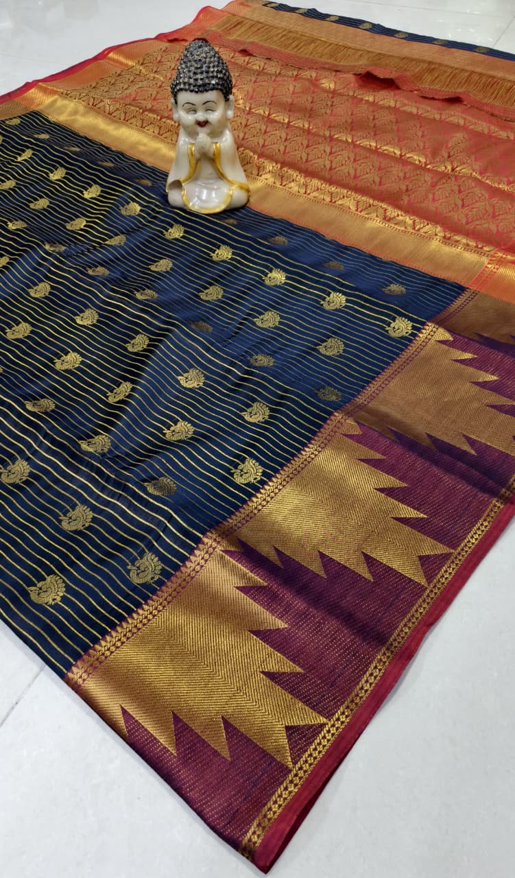 Step into elegance with our Vaira Oosi Saree, crafted to give a rich and graceful traditional look. The beautiful red base with golden zari weaving makes it perfect for all special occasions.
