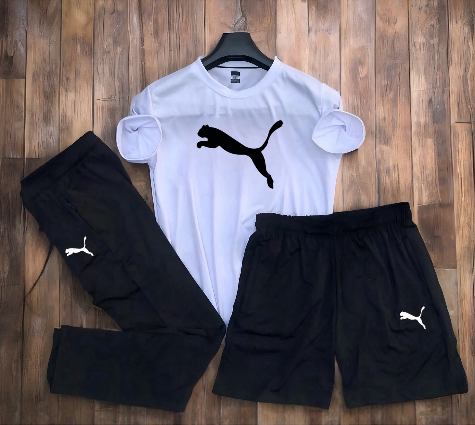 Upgrade your wardrobe with this stylish Puma 3-Pcs Set, featuring a premium Dryfit Lycra 190 GSM fabric designed for ultimate comfort, flexibility, and durability. This activewear combo includes a T-shirt, Lower, and Shorts, making it the perfect choice for gym workouts, sports, running, training, or casual wear.