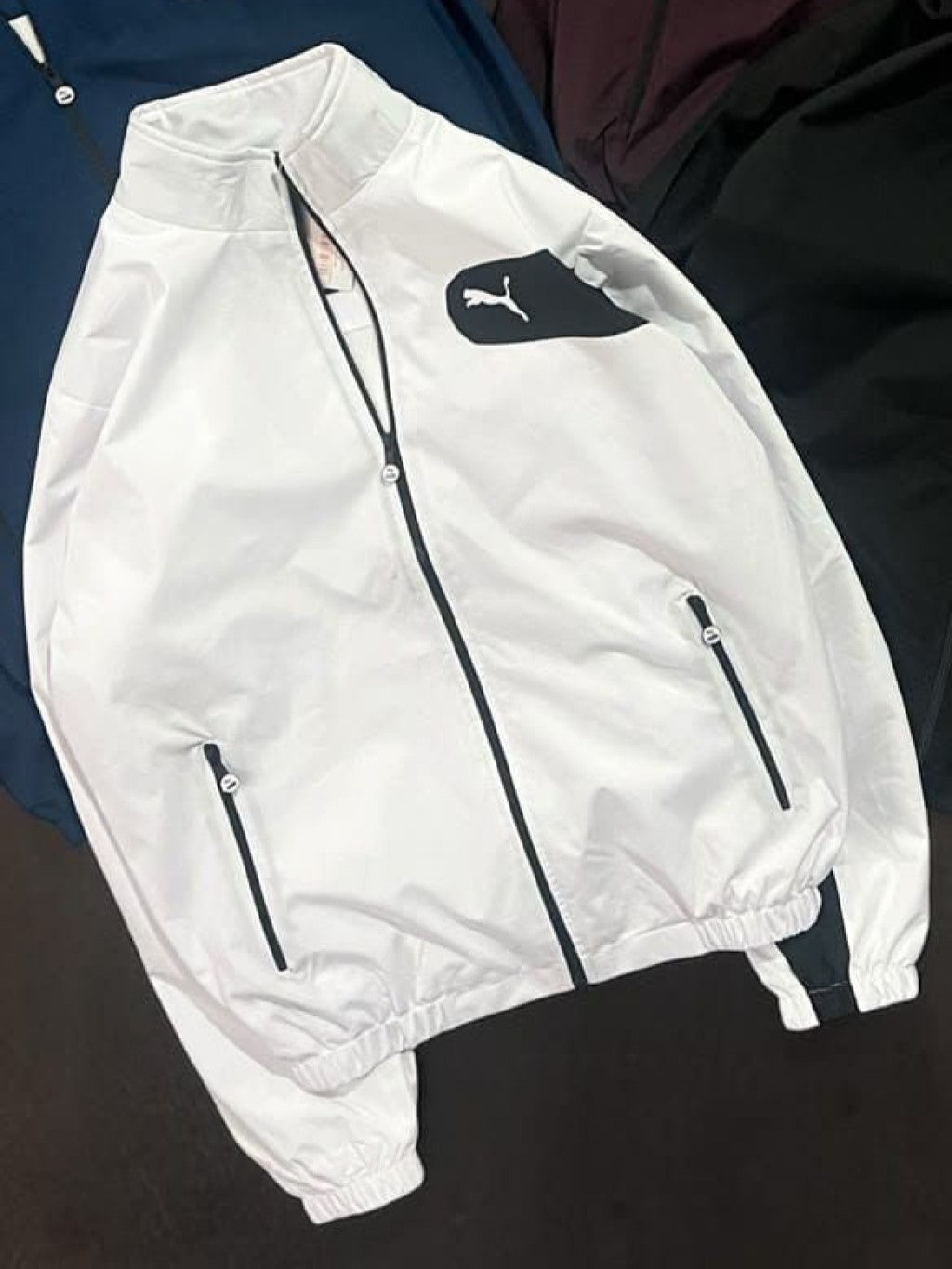 Stay stylish and protected with the&nbsp;PUMA Windcheater Upper, crafted from premium TPU fabric for lightweight comfort and durability. Designed for everyday wear, workouts, travel, and outdoor activities, this windcheater offers a modern fit with superior performance. Available in six trendy colors and multiple sizes to suit your style.