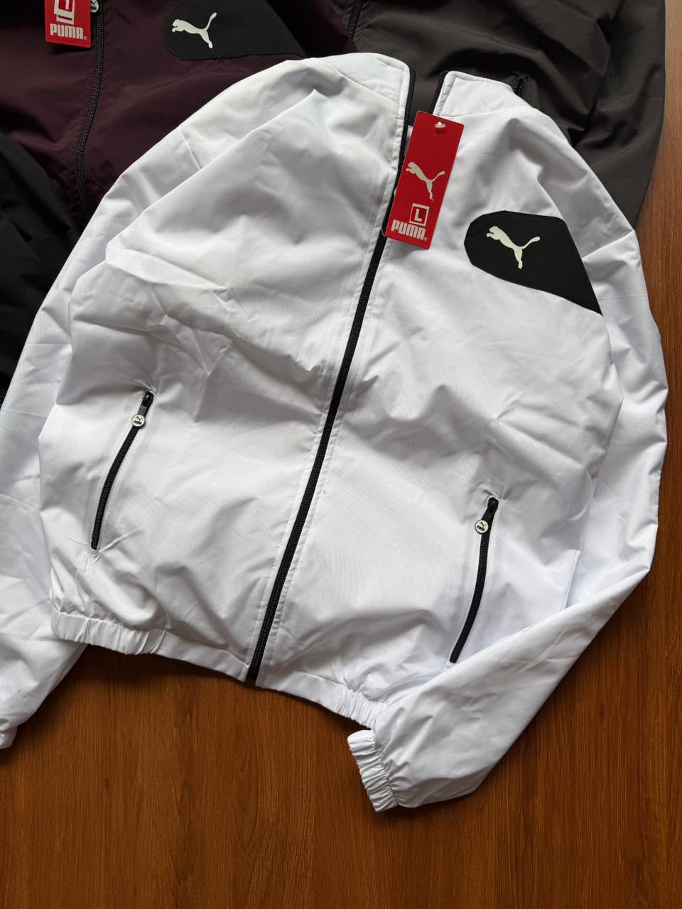 Stay stylish and protected with the&nbsp;PUMA Windcheater Upper, crafted from premium TPU fabric for lightweight comfort and durability. Designed for everyday wear, workouts, travel, and outdoor activities, this windcheater offers a modern fit with superior performance. Available in six trendy colors and multiple sizes to suit your style.