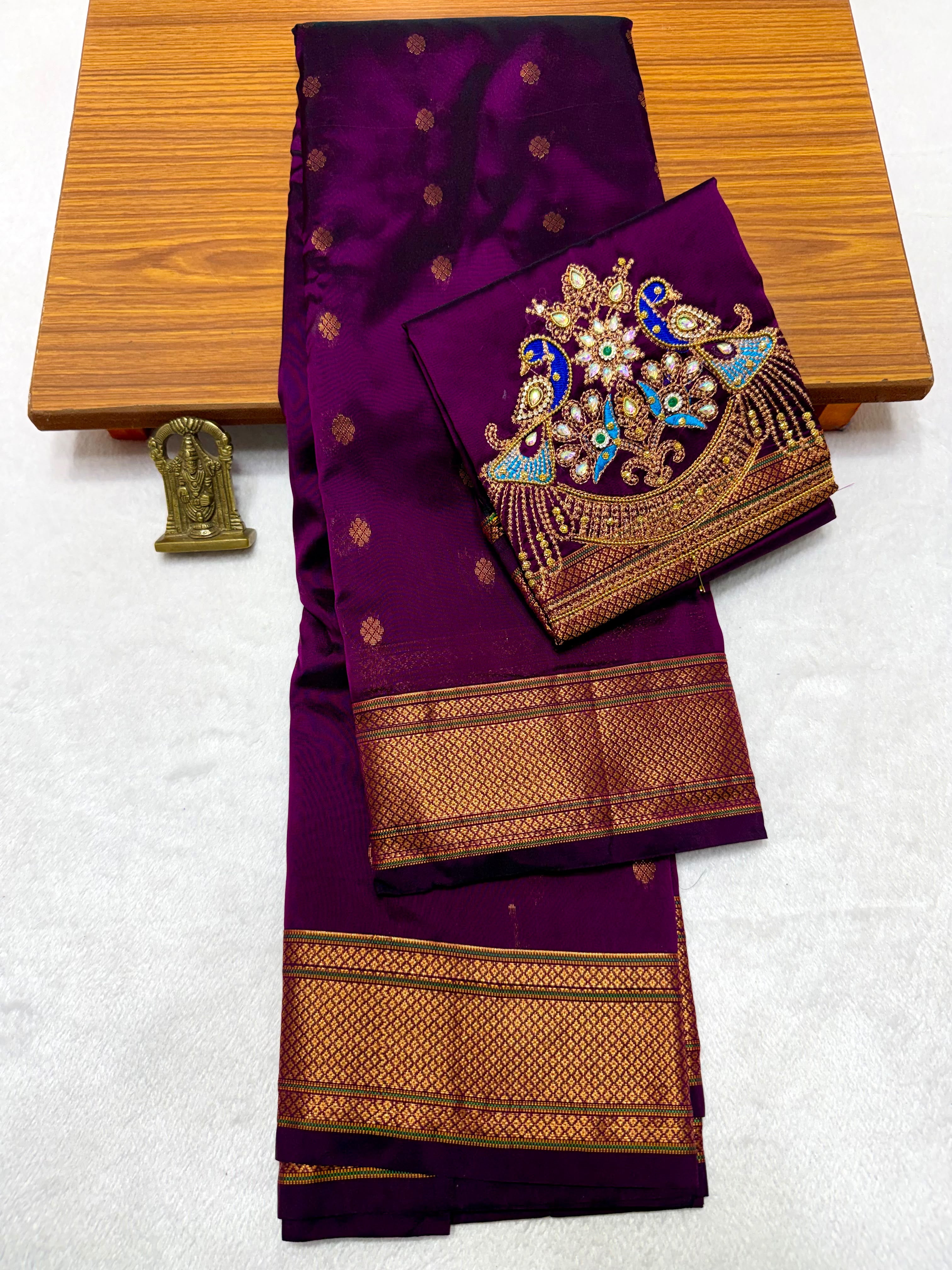 Shop elegant Pure Silk Copy Kalanjali Paithani Sarees featuring all-over butti design, rich pallu, premium Tana silk fabric, and exquisite Aari work blouse piece. Premium quality ethnic wear for weddings, festivals, and special occasions.