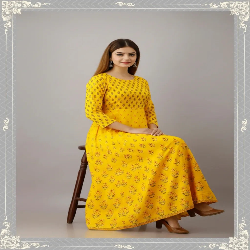 This Long Gown features a flared design and vibrant yellow color with a stunning printed design, perfect for any occasion. Made for women, this gown offers both style and comfort. With its flared silhouette and eye-catching print, this gown is sure to make a statement.