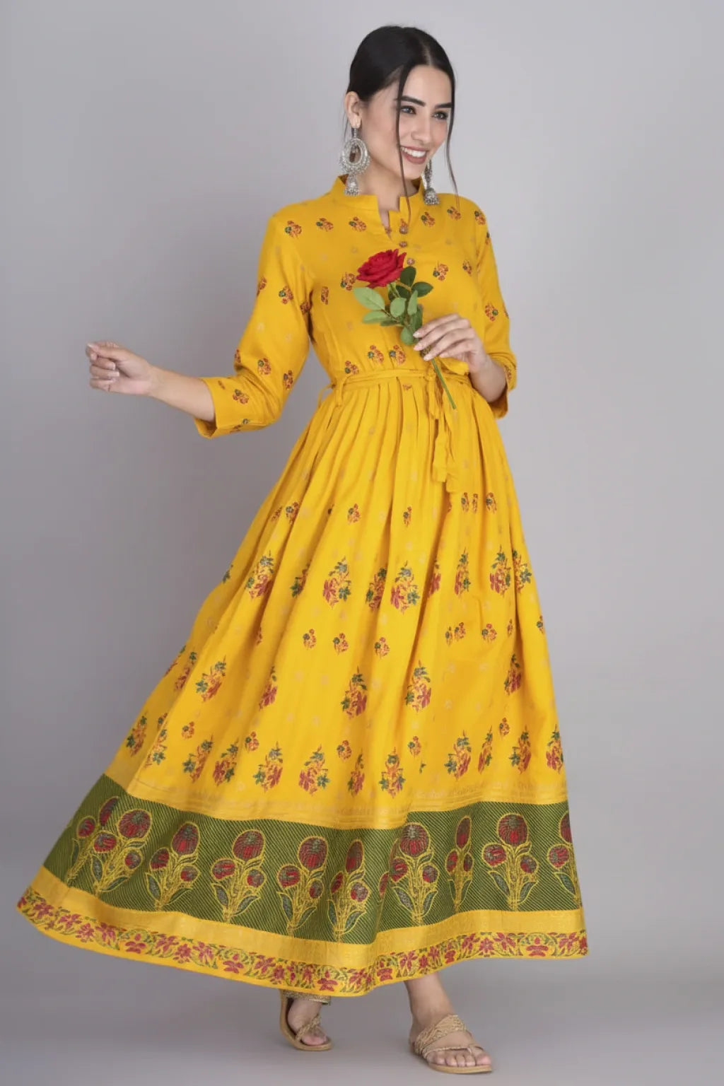 Discover the intricate design and superior quality of our Anarkali Dress-Long Gown kurti. Made from soft and durable Rayon, this dress features a pleted waist for a flattering fit