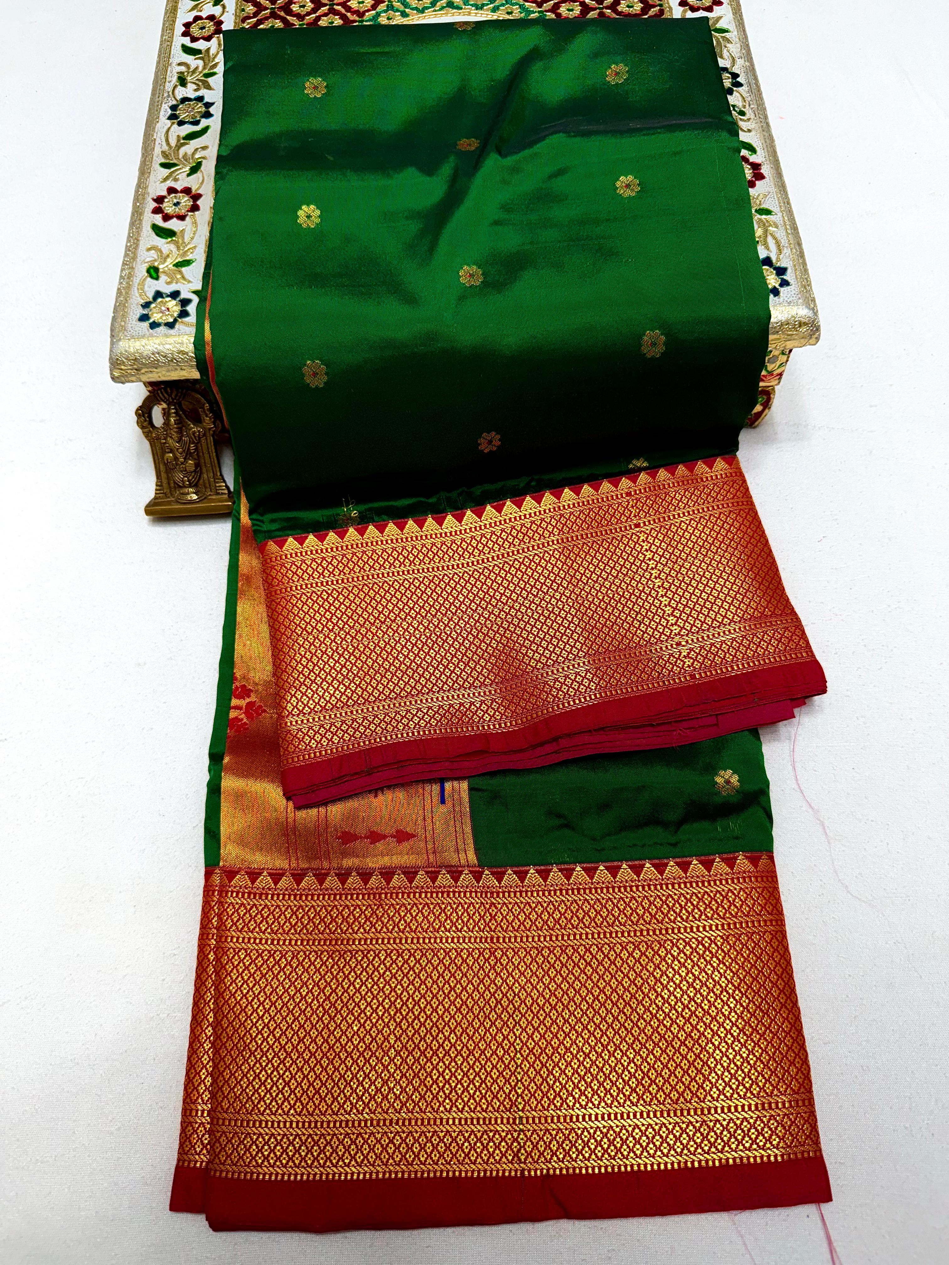 Step into timeless elegance with our Premium Copy of Pure Silk Yeola Kadiyal Paithani Saree, featuring exquisite 4x4 handmade Paithani Pallu and all-over intricate buttis that embody true artistry.