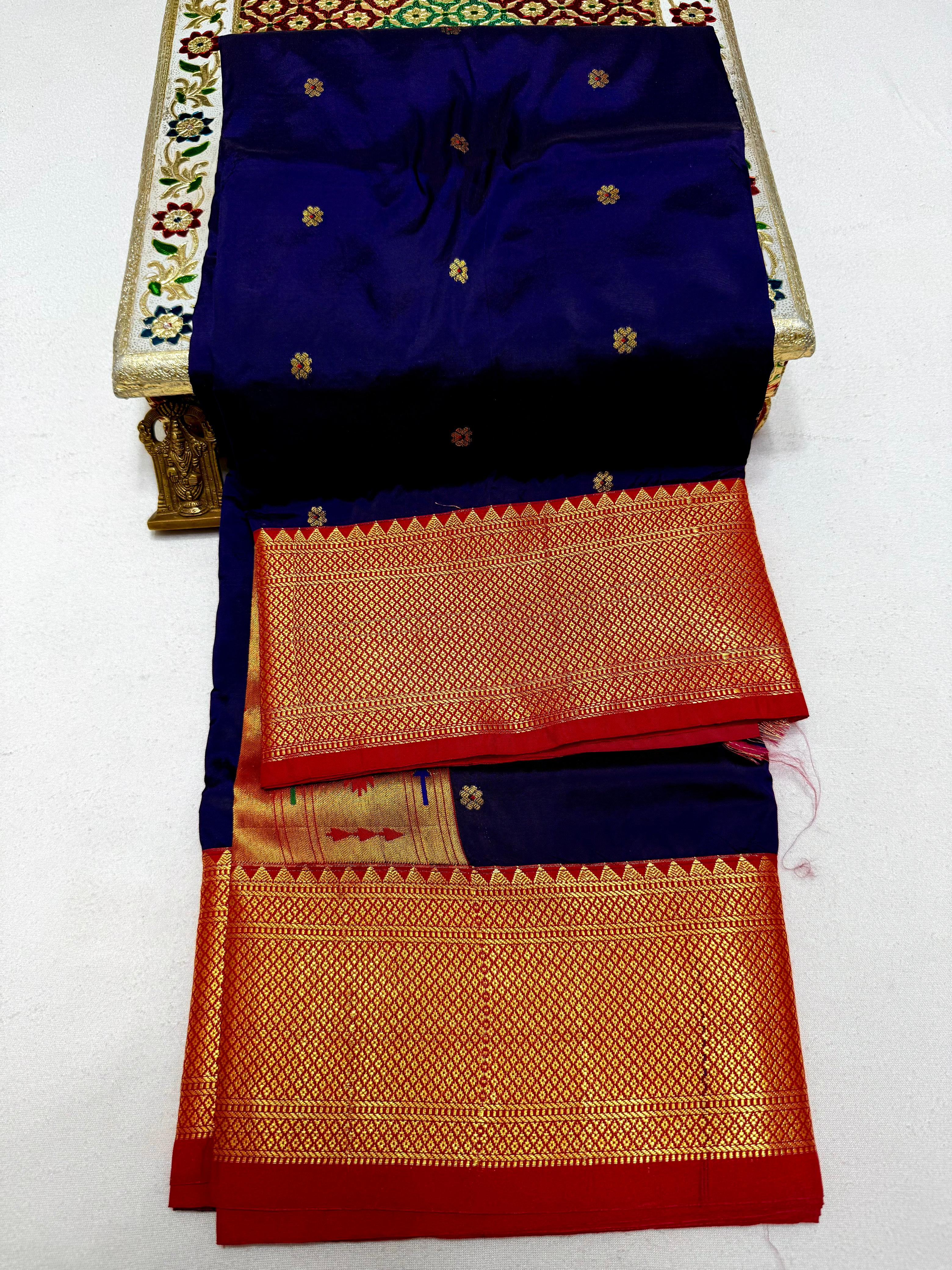 Step into timeless elegance with our Premium Copy of Pure Silk Yeola Kadiyal Paithani Saree, featuring exquisite 4x4 handmade Paithani Pallu and all-over intricate buttis that embody true artistry.