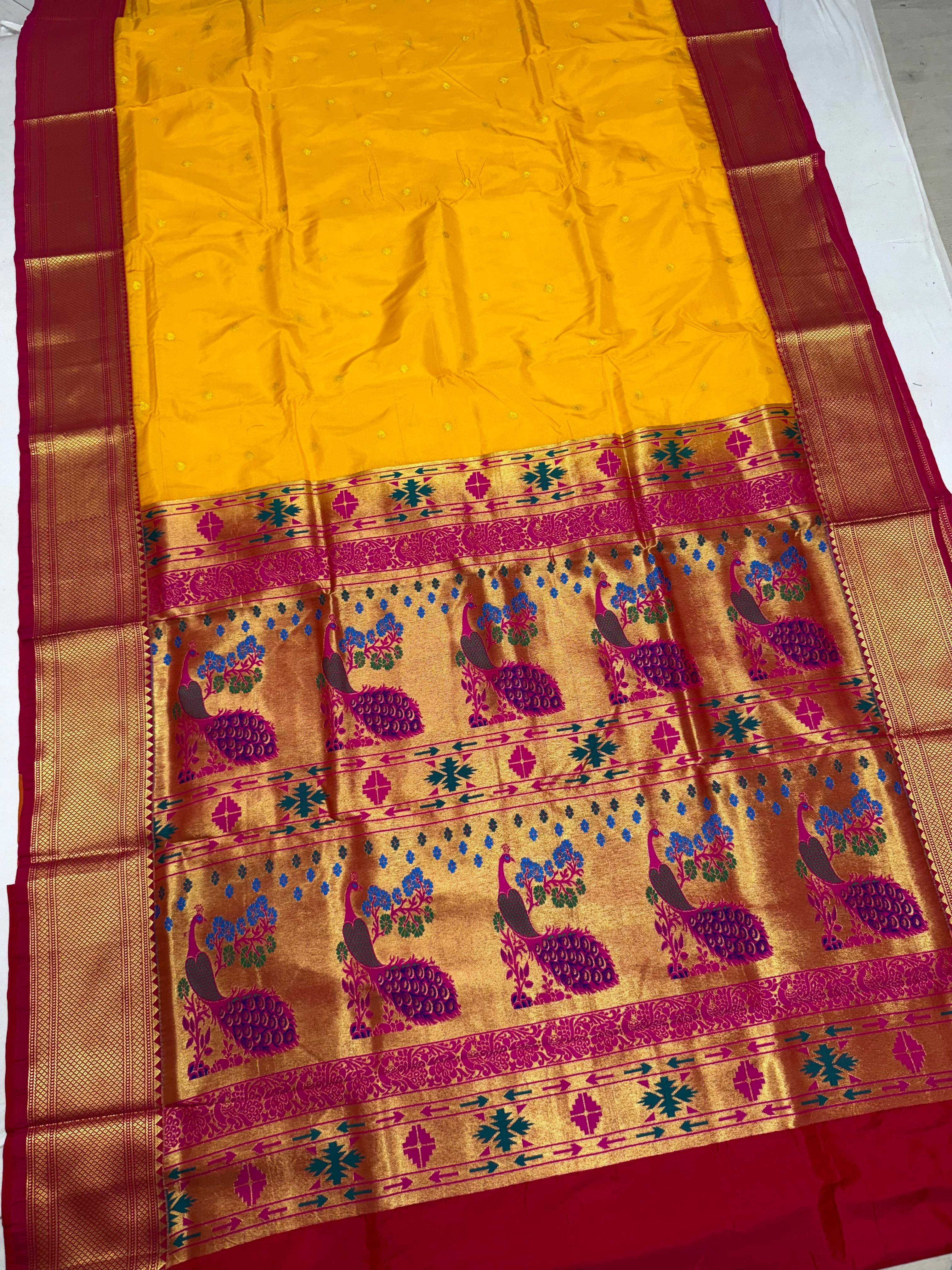 Step into timeless elegance with our Premium Copy of Pure Silk Yeola Kadiyal Paithani Saree, featuring exquisite 4x4 handmade Paithani Pallu and all-over intricate buttis that embody true artistry.