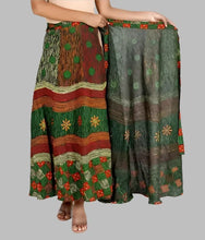 Load image into Gallery viewer, Rangun Printed Cotton Wrap Around Skirt For Women&#39;s

Color: Green
Size: Free Size
Waist: 36.0 - 44.0 inches.
Type: Skirts
Style: Other
Stitched: Stitched
Style name: flared
&nbsp;Product material: pure cotton
Packagin quantity: 1 Wrap Around Skirt

You will be tagged as a style diva when you wear these trendy Wrap Around Skirt. Made from Cotton. Featuring solid design, these Wrap Arounds can be clubbed with a trendy top for a chic look. 100% cotton fabrics.