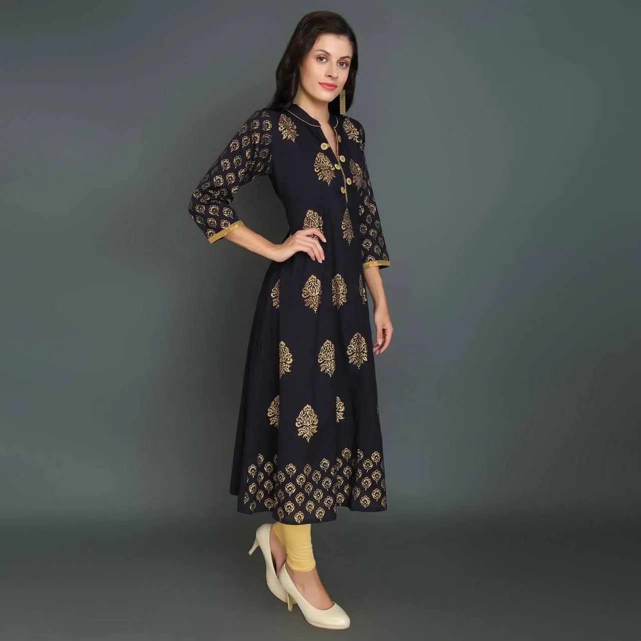 As a beautiful, yet versatile garment, the Gorgeous Rayon Gold Black Kurti is destined to impress. Made with high-quality rayon fabric, this kurti showcases a stunning gold and black design that can be dressed up or down for any occasion. With its comfortable and flattering fit, this kurti is sure to turn heads and make you feel confident and elegant.
