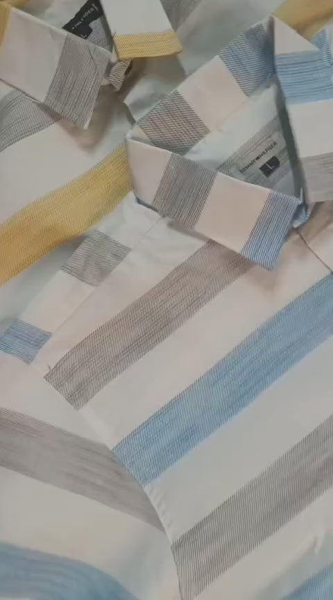 Tommy Hilfiger Cotton Premium Regular Fit Lining Shirt – Stylish full sleeve lining shirt crafted in breathable cotton. Perfect for casual and office wear, available in Yellow &amp; Green. Sizes: M, L, XL.