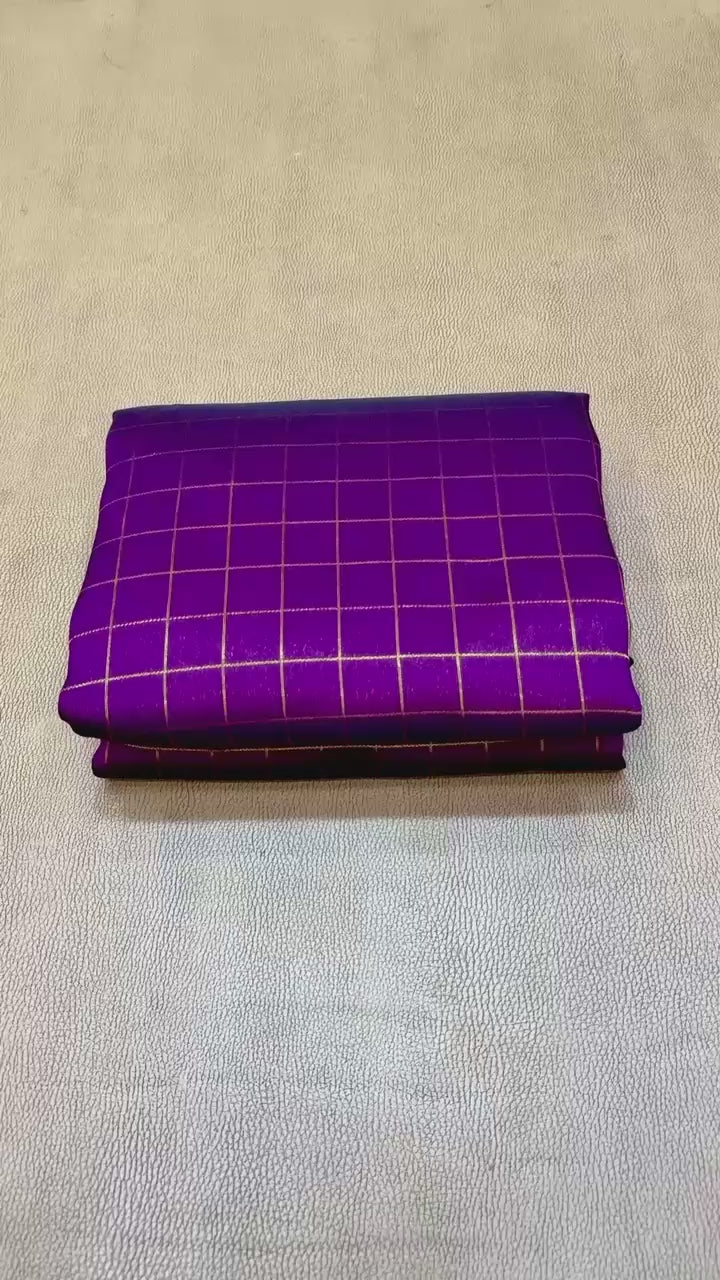 New Design Launching Shop the elegant Neha Checks Irkal Paithani Saree, crafted from premium Katan silk that feels like pure silk. Designed with all-over classic checks and paired with an exclusive contrast blouse, this saree is perfect for festive wear, weddings, and special occasions. Experience tradition with a modern touch.