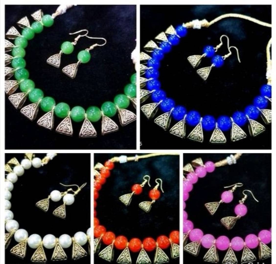 Trendy Alloy Beads Necklace Set Combo (Combo Of 5). This set of five trendy necklace combos features unique and stylish designs made from high-quality alloy and beads. With a variety of styles to choose from, this combo offers the perfect accessory for any outfit. Enhance your look with these fashionable and versatile necklaces.