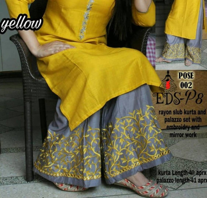 Alluring Golden Embroidered Rayon Slub Women Kurta Palazzo Set