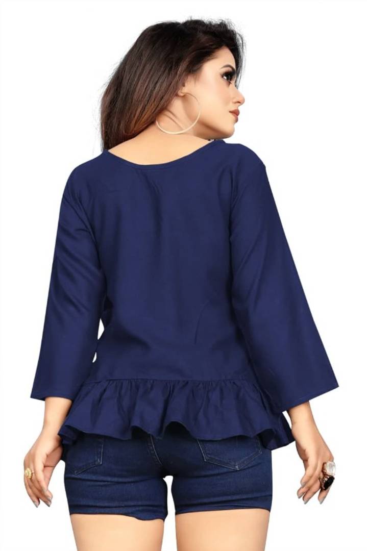 Stunning Navy Blue Heavy Rayon Solid Cross Flared Tops For Women And Girls