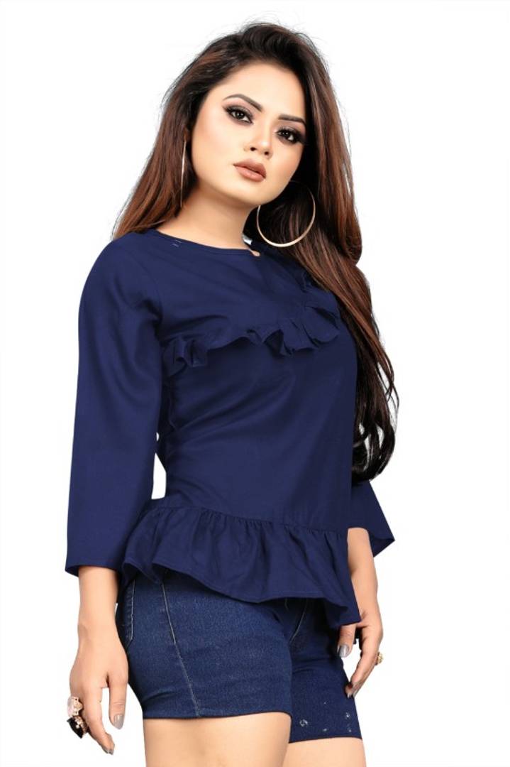 Stunning Navy Blue Heavy Rayon Solid Cross Flared Tops For Women And Girls